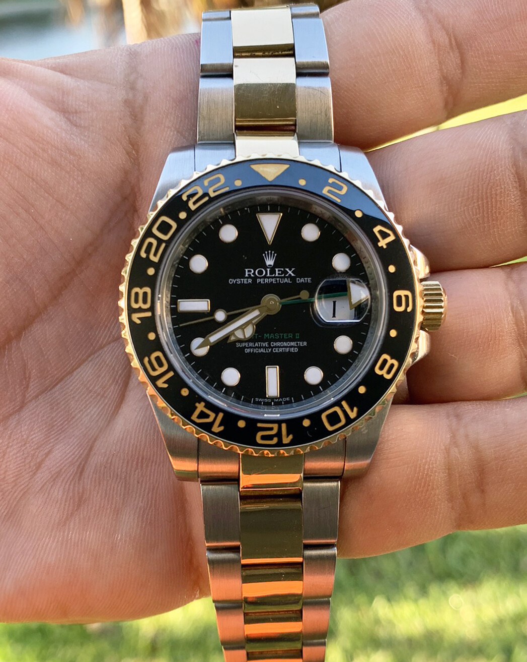 Rolex GMT-Master II Two Tone Gold Ceramic Bezel Black Dial Bidirectional Bezel