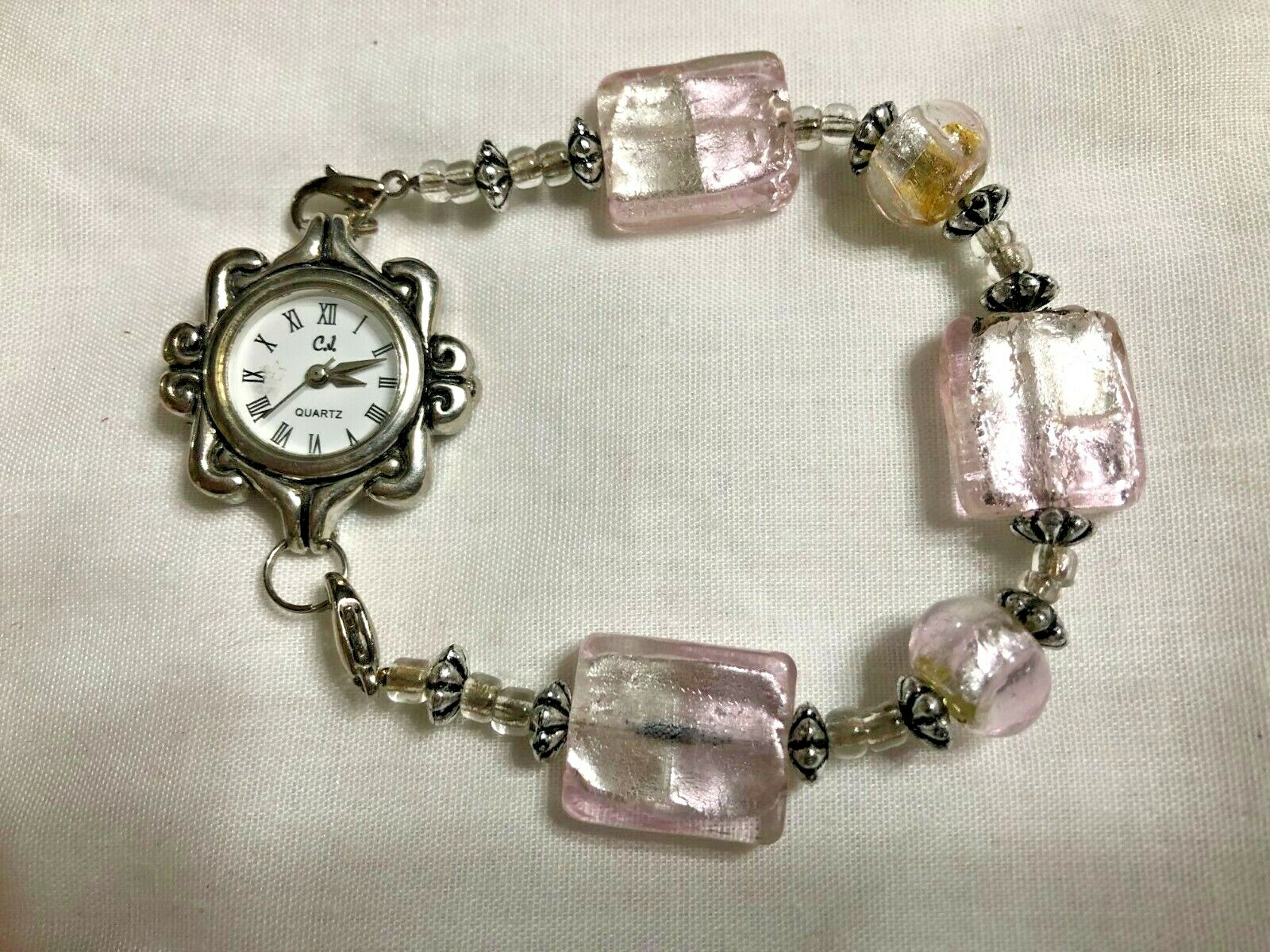 Claudia Jublot watch w glass acrylic square and round bracelet band approx 7 in