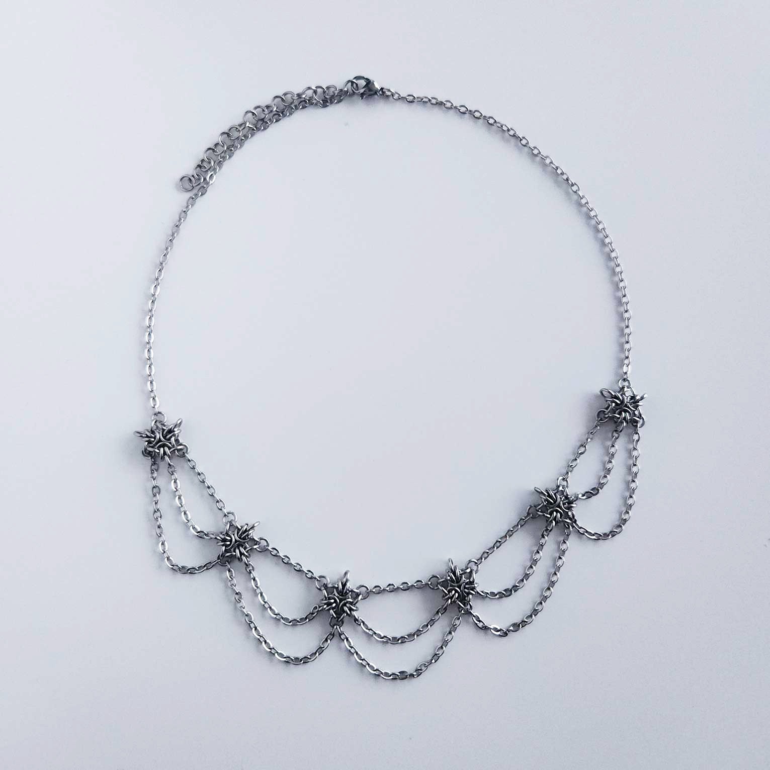 Victorian Gothic style silver chandelier necklace with dangly chains