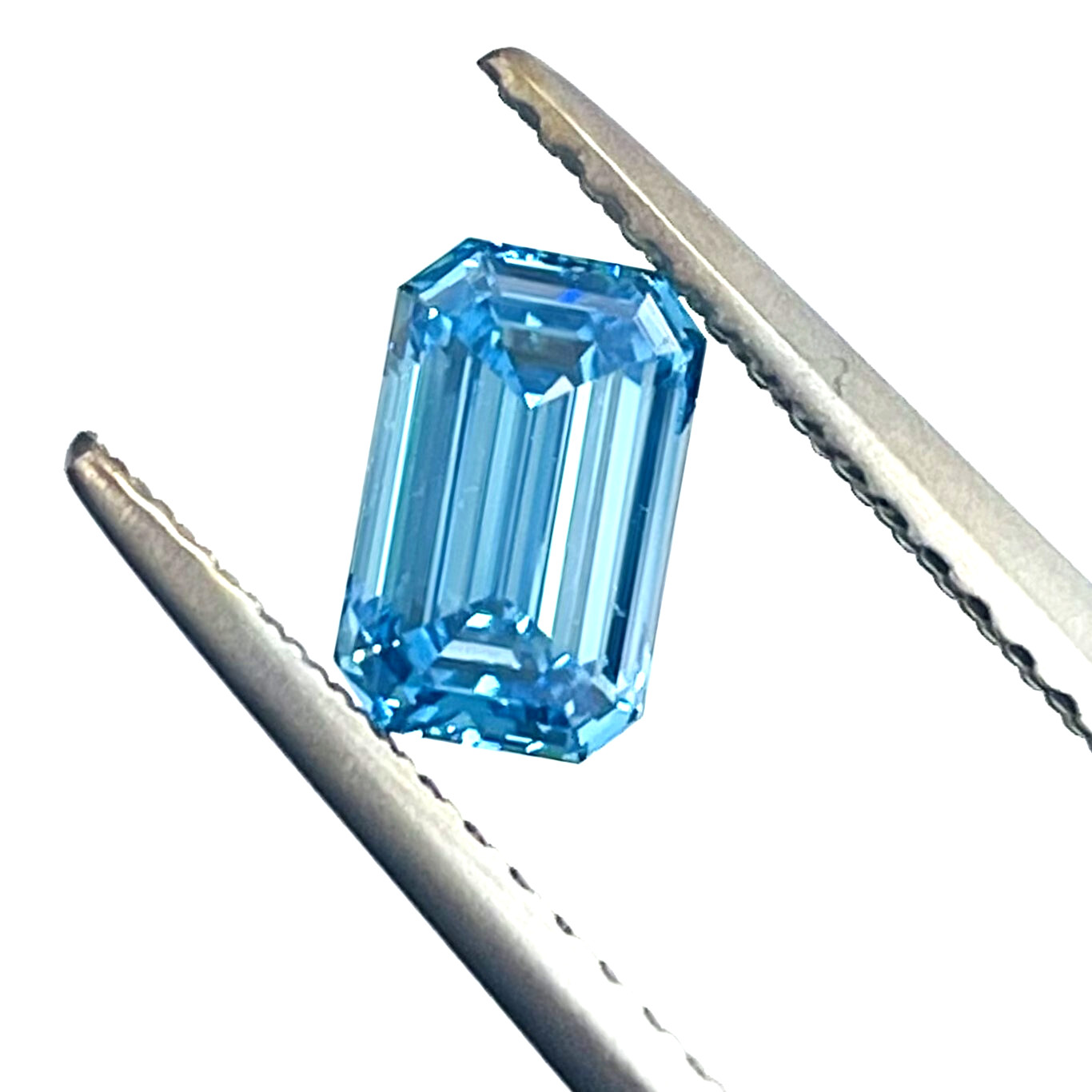 0.78 Carat Fancy VIvid Blue Diamond GIA Certified VS1 Emerald Cut