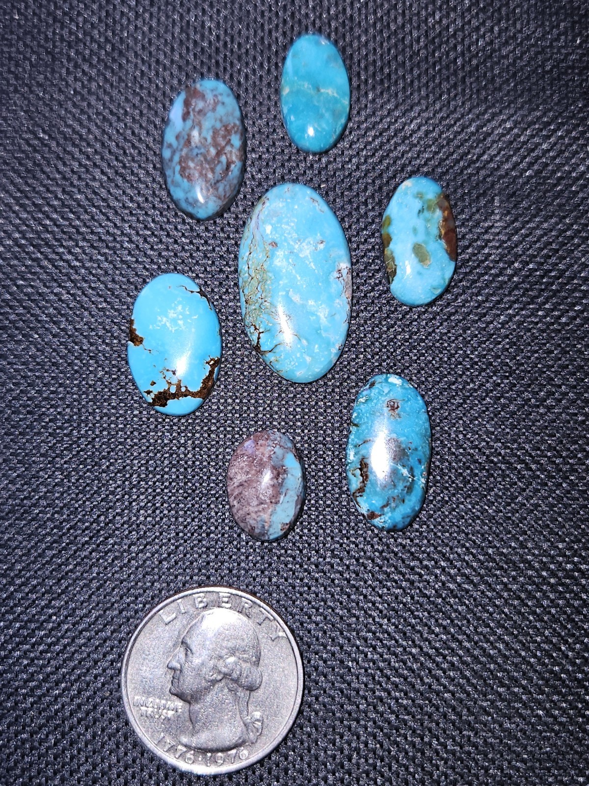 Rare Bisbee Turquoise Ovals – Backed – 7 pieces – 48.905 carats total