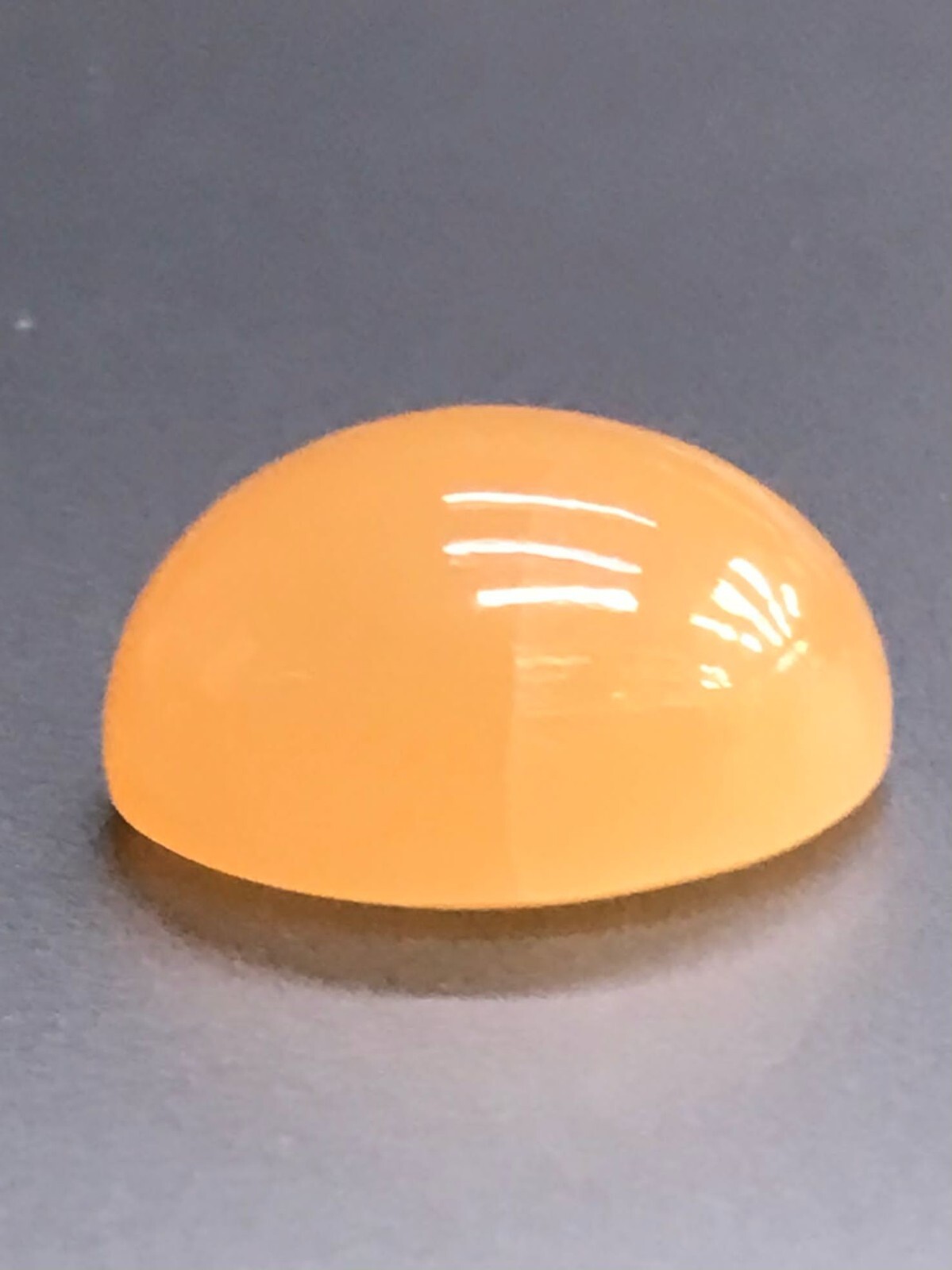15.56CTS 18X13X9MM Orange and brown moonstone loose gemstone cabochon