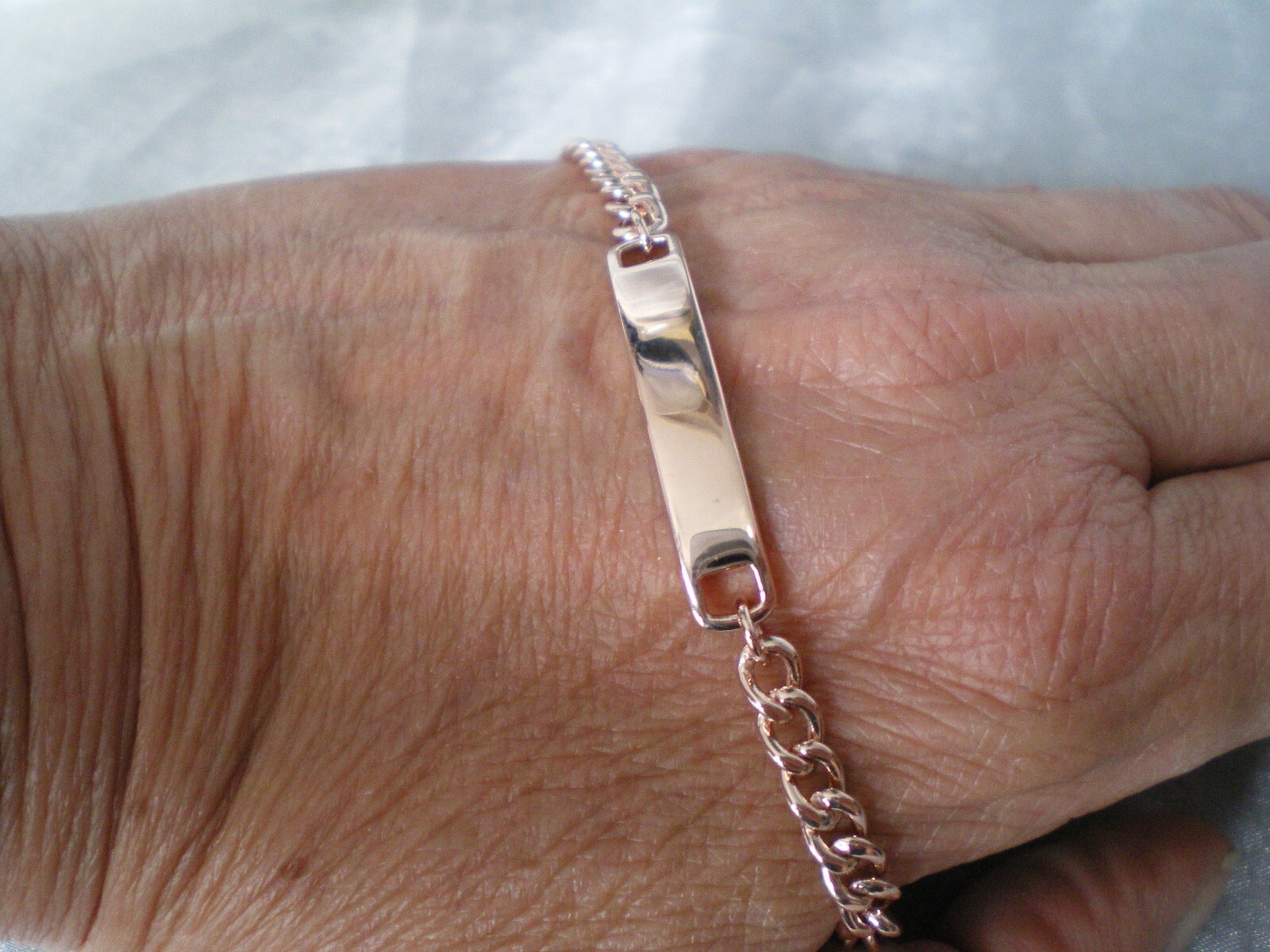 Identity bracelet, 8 inches, 11.68 grams of 925 Sterling Silver, Rose Gold over