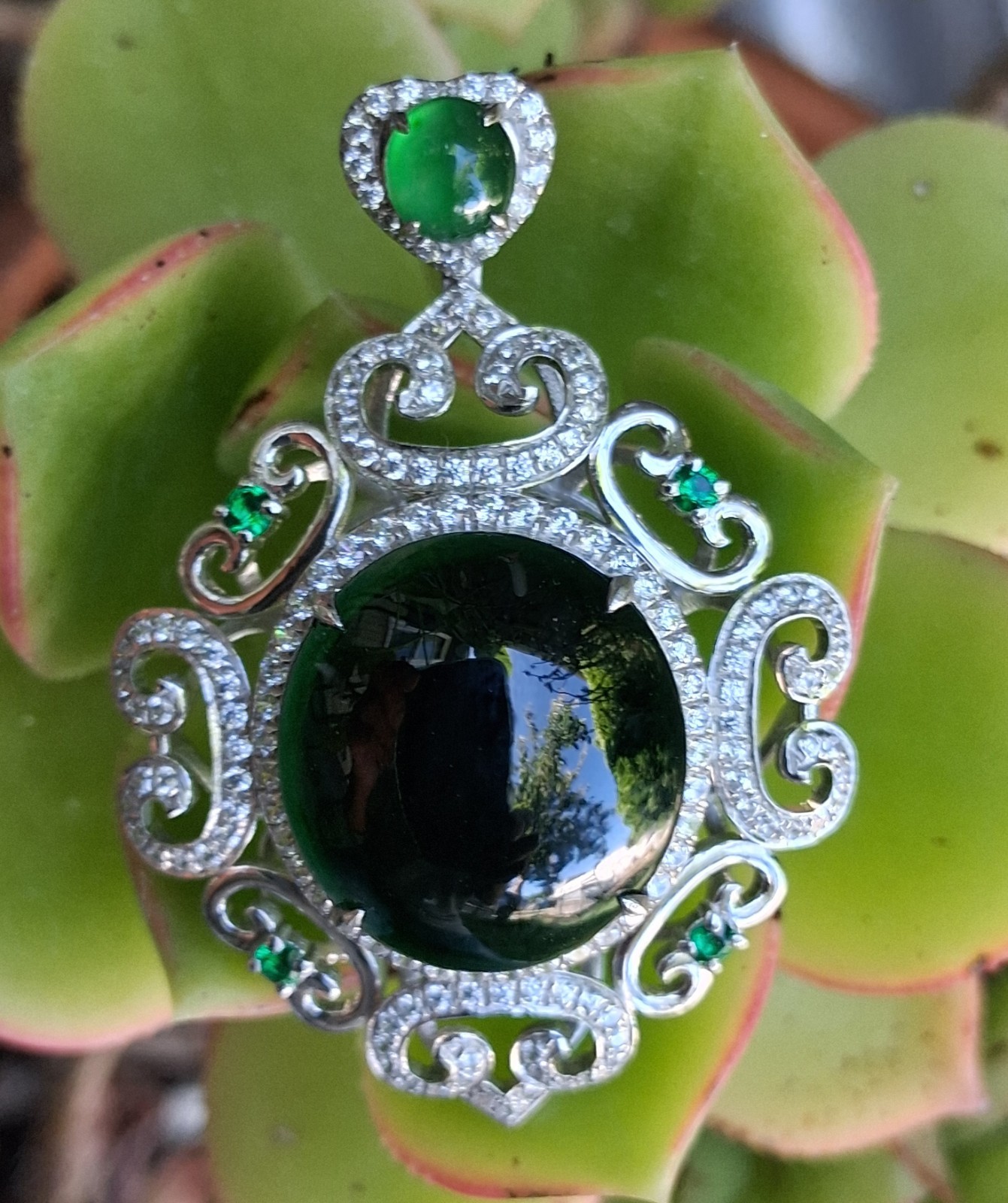 Silver Tone Ornate Scrollwork Oval Pendant Green Oval Cabochon & Accents