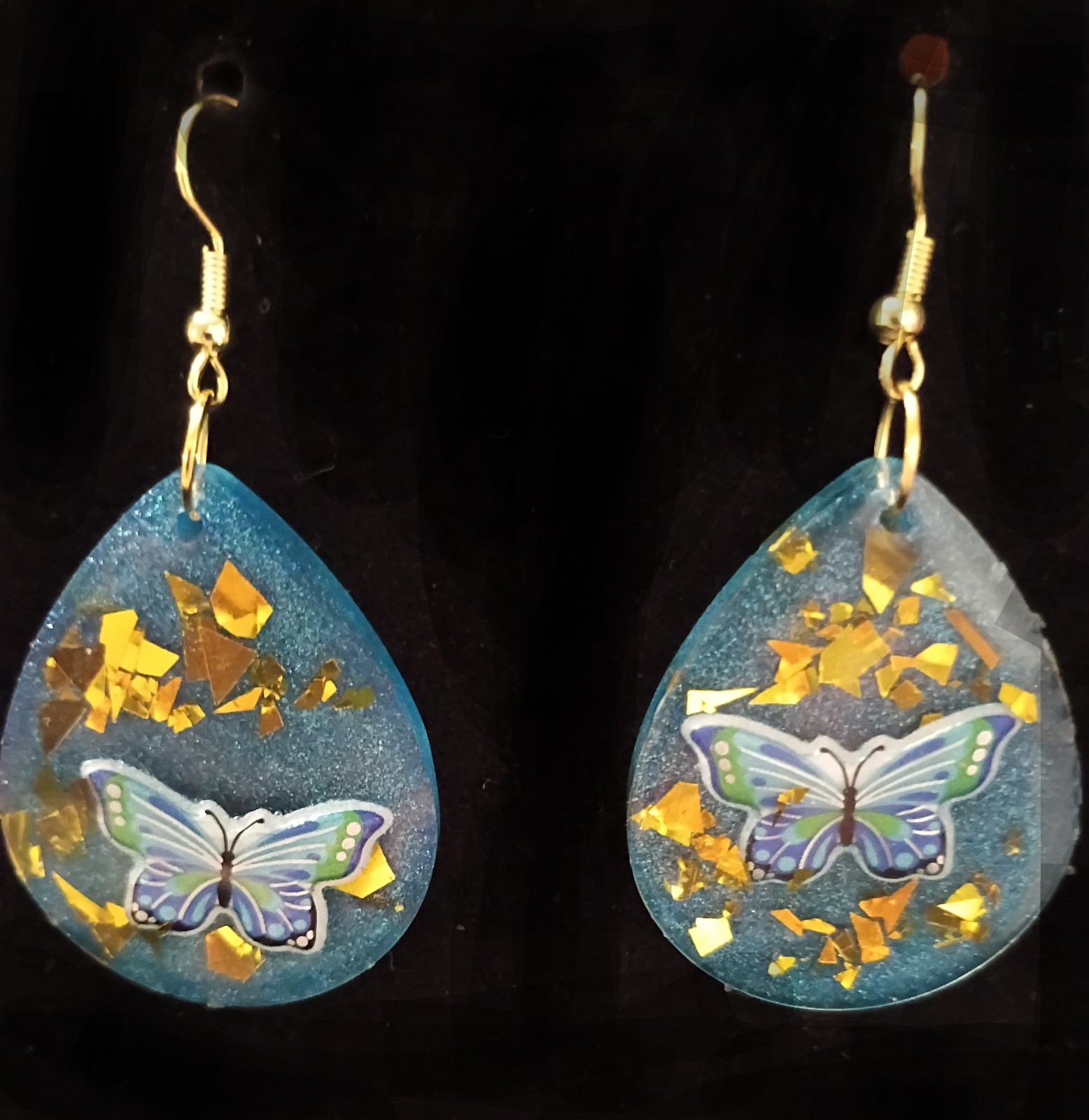 womens handmade resin earrings, butterflies are free. Blue tone w gold