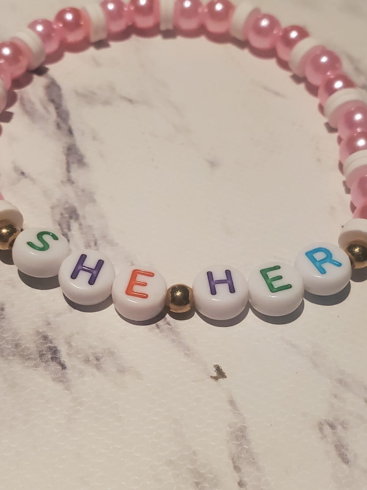 Handmade “She Her” Pink & White Beaded Bracelet