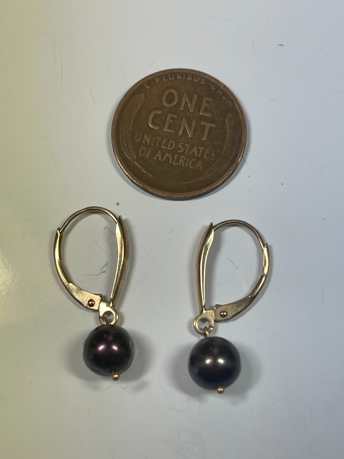 10K gold 6.9mm Black Freshwater Pearl JCM Dangle Earrings.