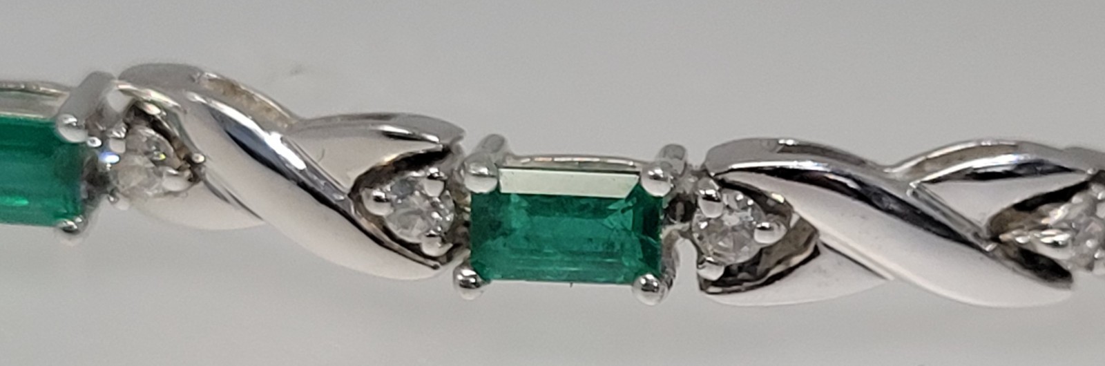 18k White Gold 3.3 cttw Gorgeous Emeralds and .63 cttw Diamond Bracelet