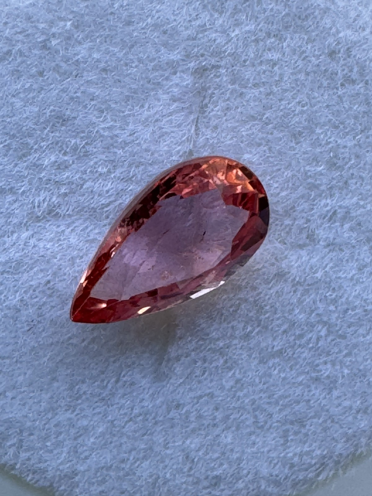 GIA Orangy Pink Sapphire Pear. 0.67 Carats 7.1 x 4.2 mm VSI, Beryllium Diffused