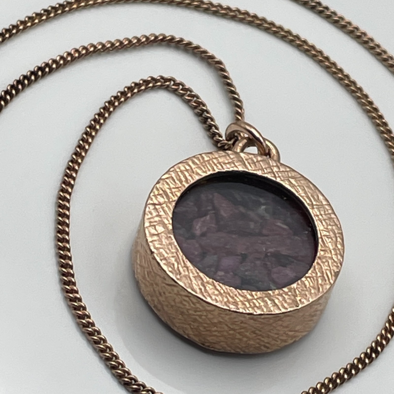 Rose gold on sterling silver/ruby amulet pendant and ‘925’ chain necklace 10.26g