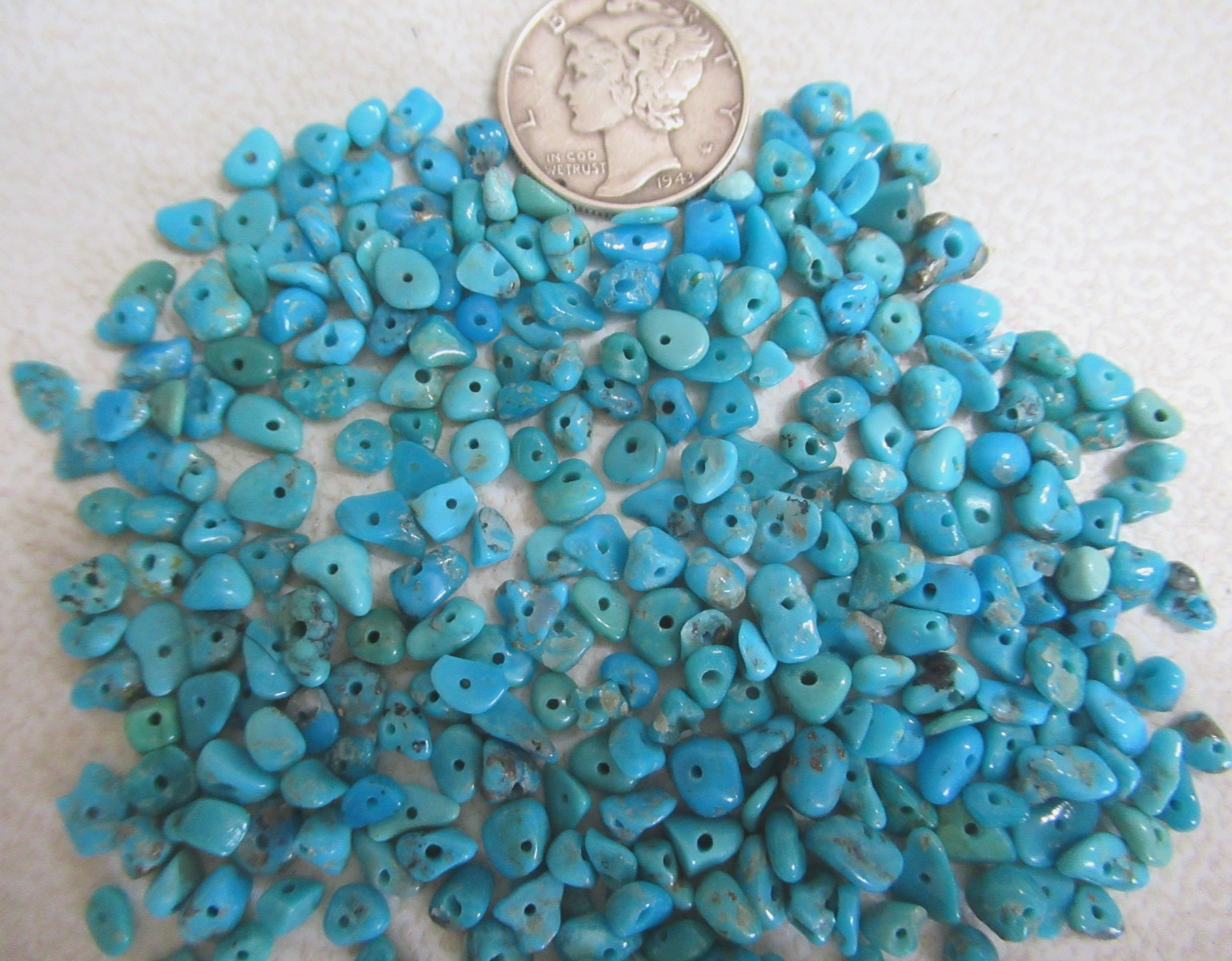 SLEEPING BEAUTY TURQUOISE 1/2 OZ SMALL DRILLED NUGGETS 3X2mm TO 6X4mm #765