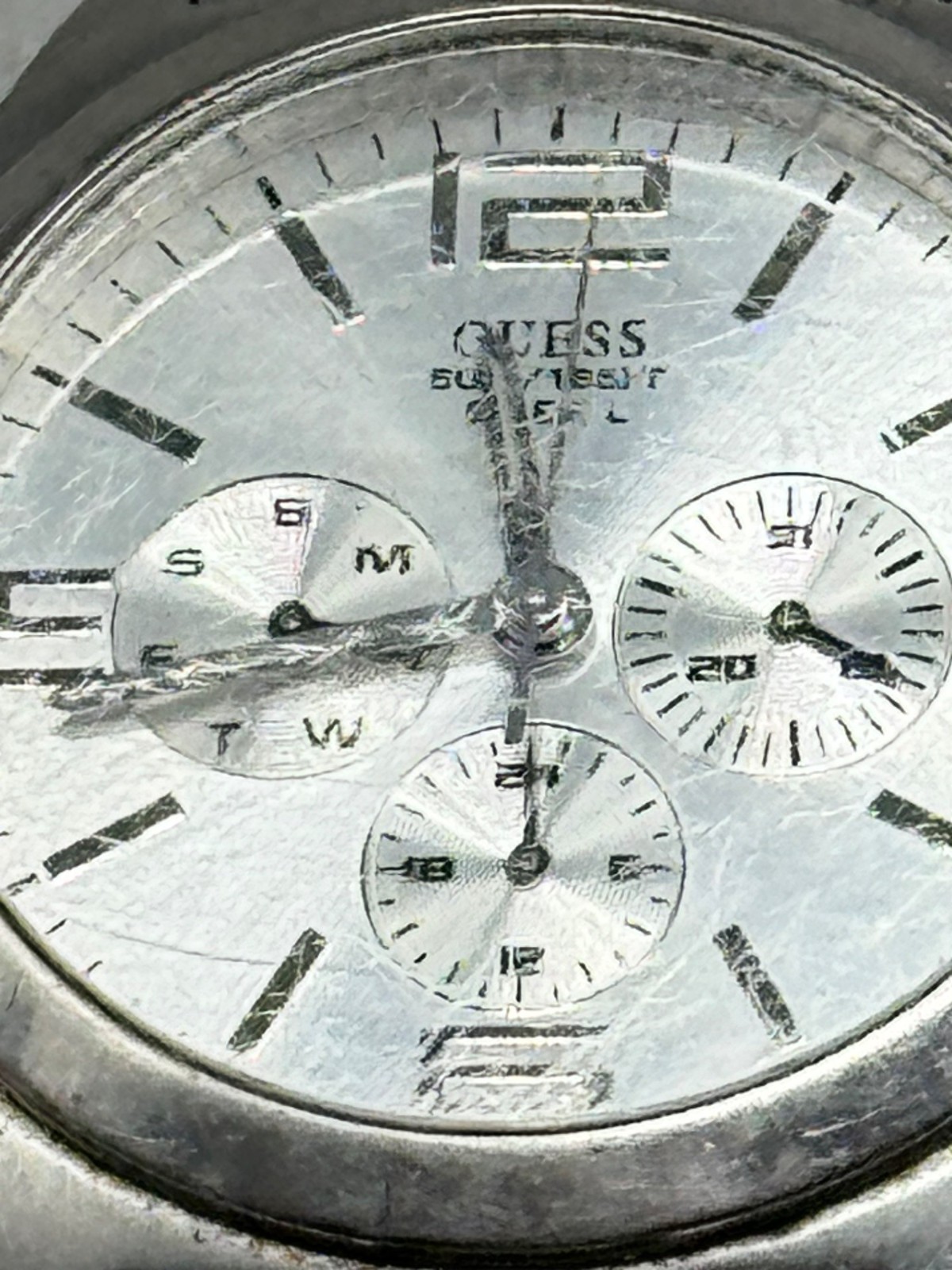guess steel men’s watch 50 meters 165 feet water resistant made in Japan READ