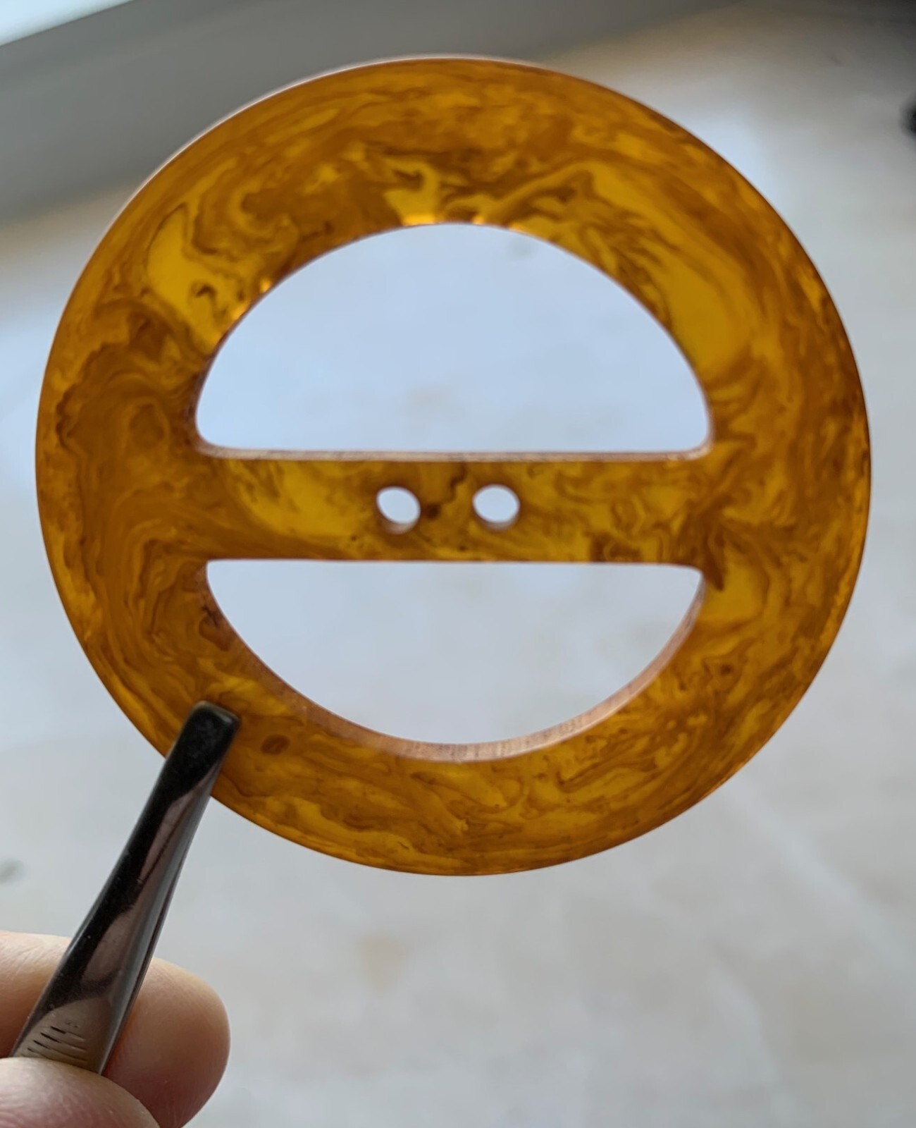 Swirled Bakelite Deco. Each is about 2″ wide and 1/16″ deep. Per piece price.