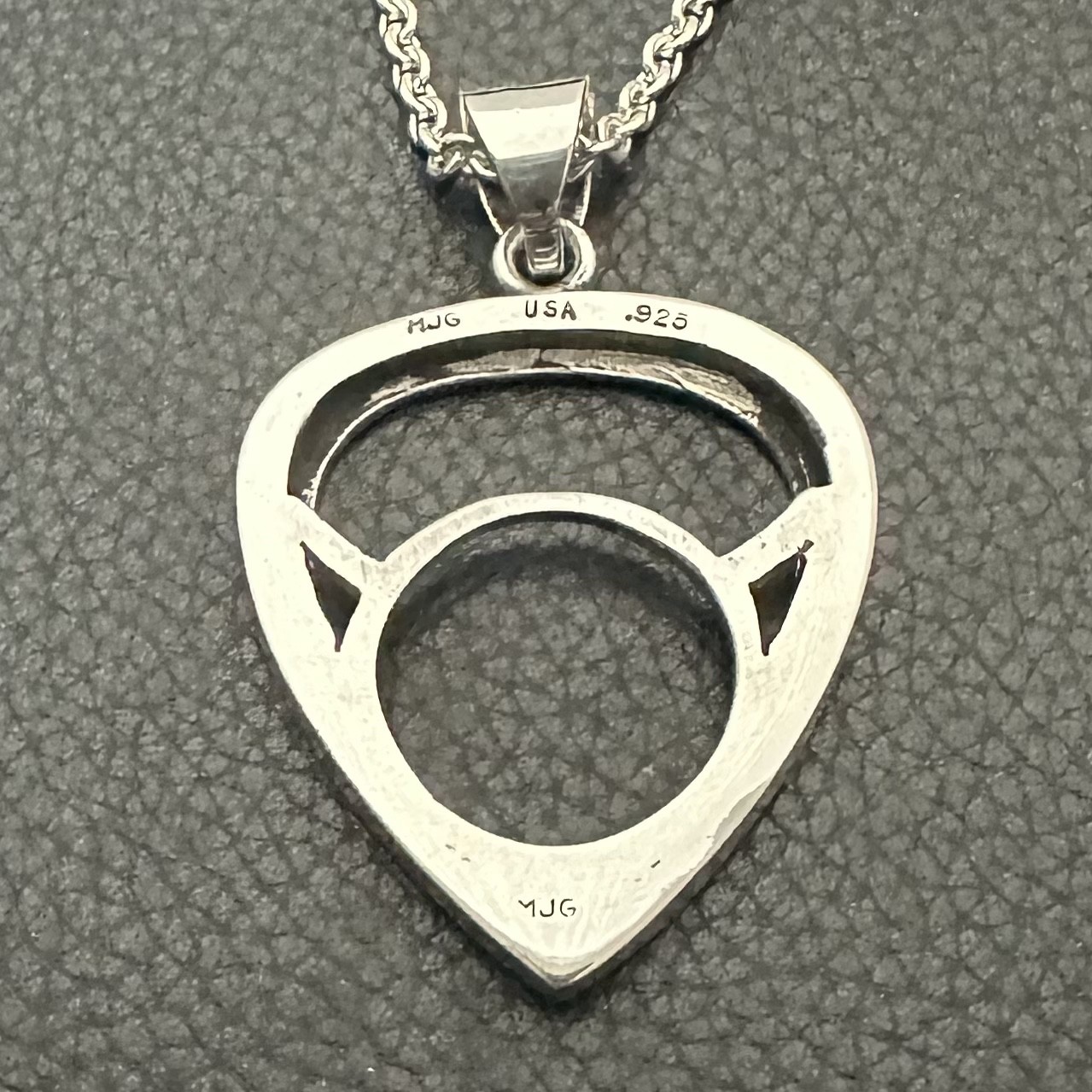 MJG STERLING SILVER. GUITAR PICK HOLDER/ PENDANT + CHAIN. JIMI. 12 GRAMS.