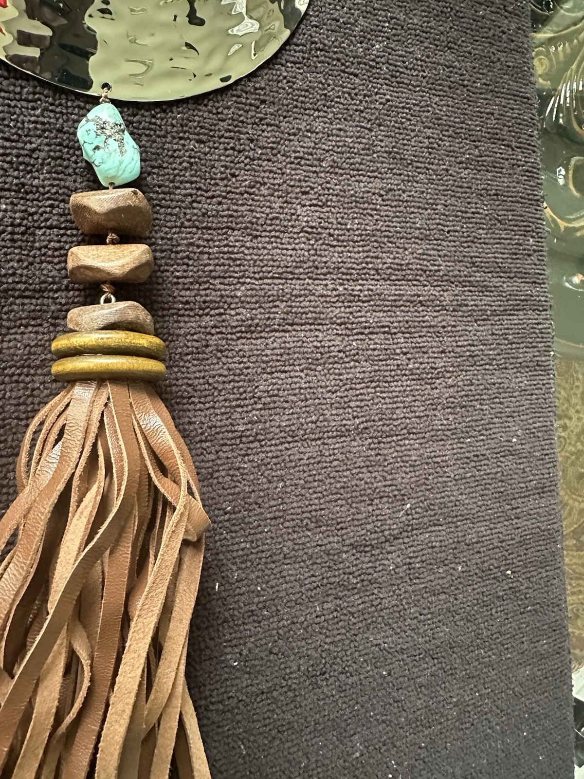 Chico’s boutique necklace; turquoise stone, metal with leather fringes;
