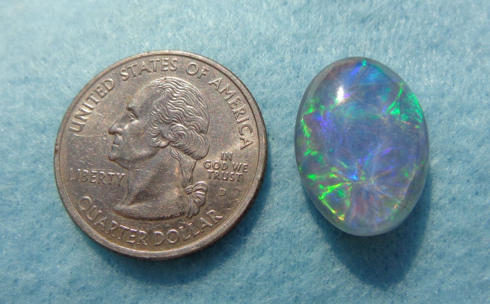 Spencer Idaho Opal Triplet 15X20mm with a Blazing Green Fire in a Galaxy Pattern