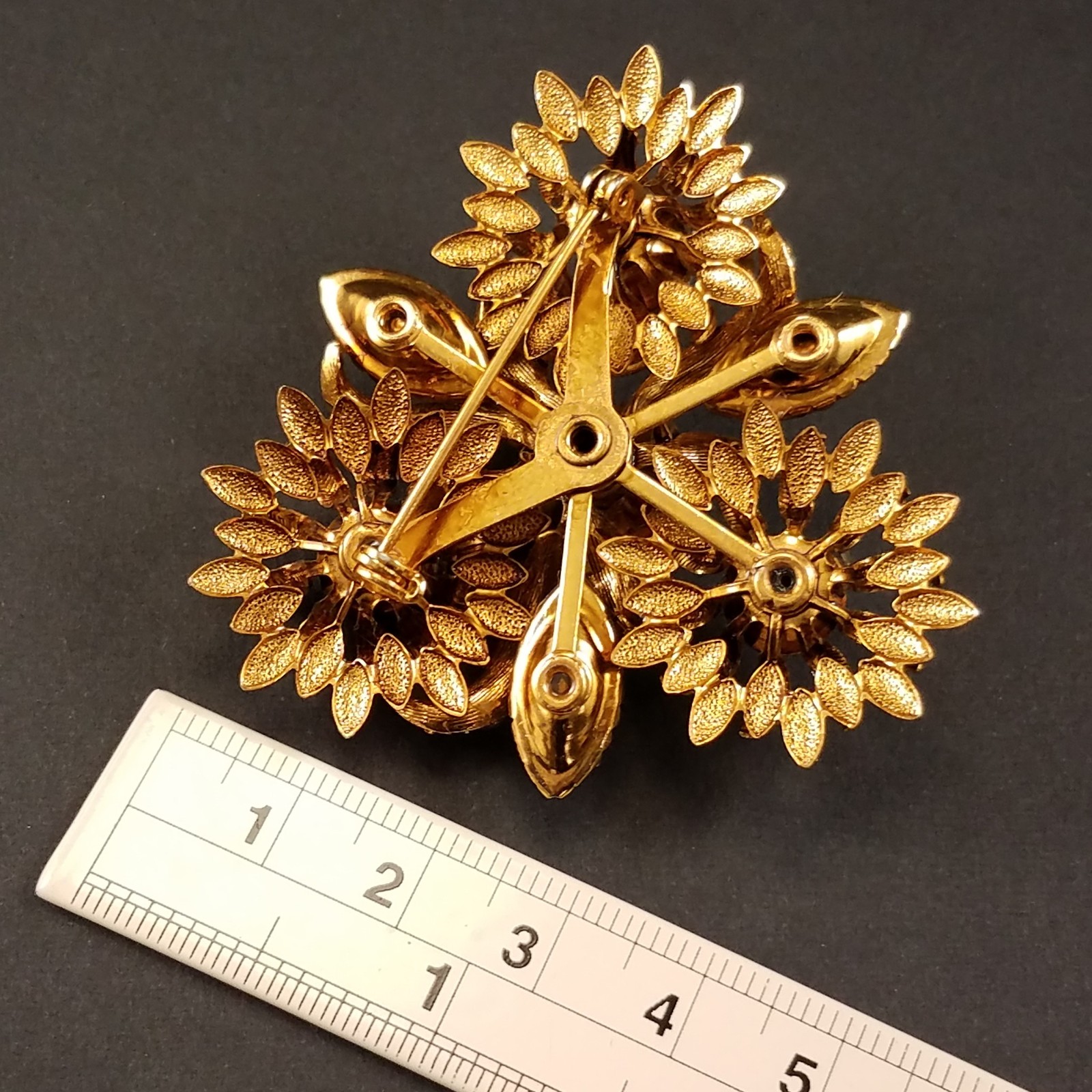 Vintage Riveted Statement Brooch Smoky Navette Crystal Runway Gold Tone Pin