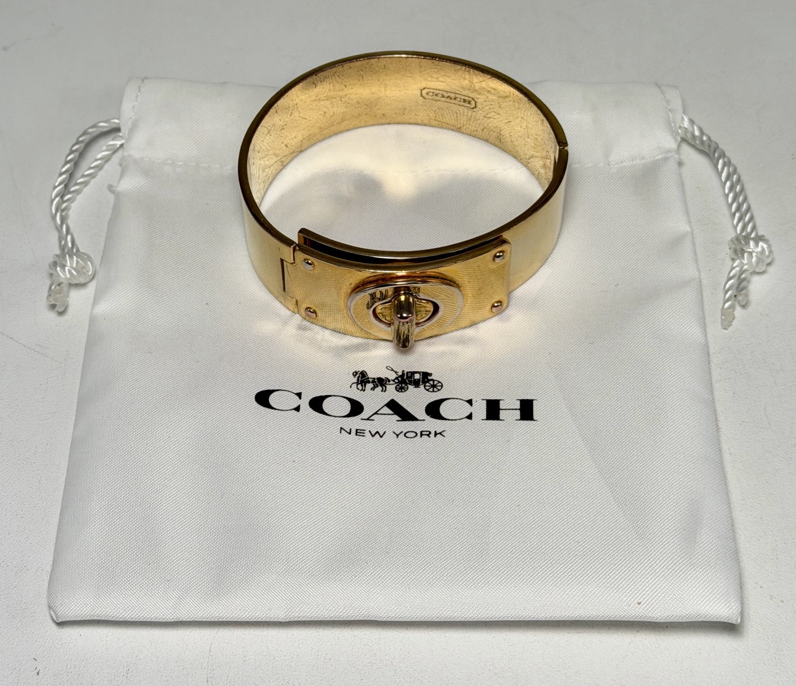 Coach Shiny Gold Turn Lock Bracelet Bangle Opens closes 3/4″ Thick