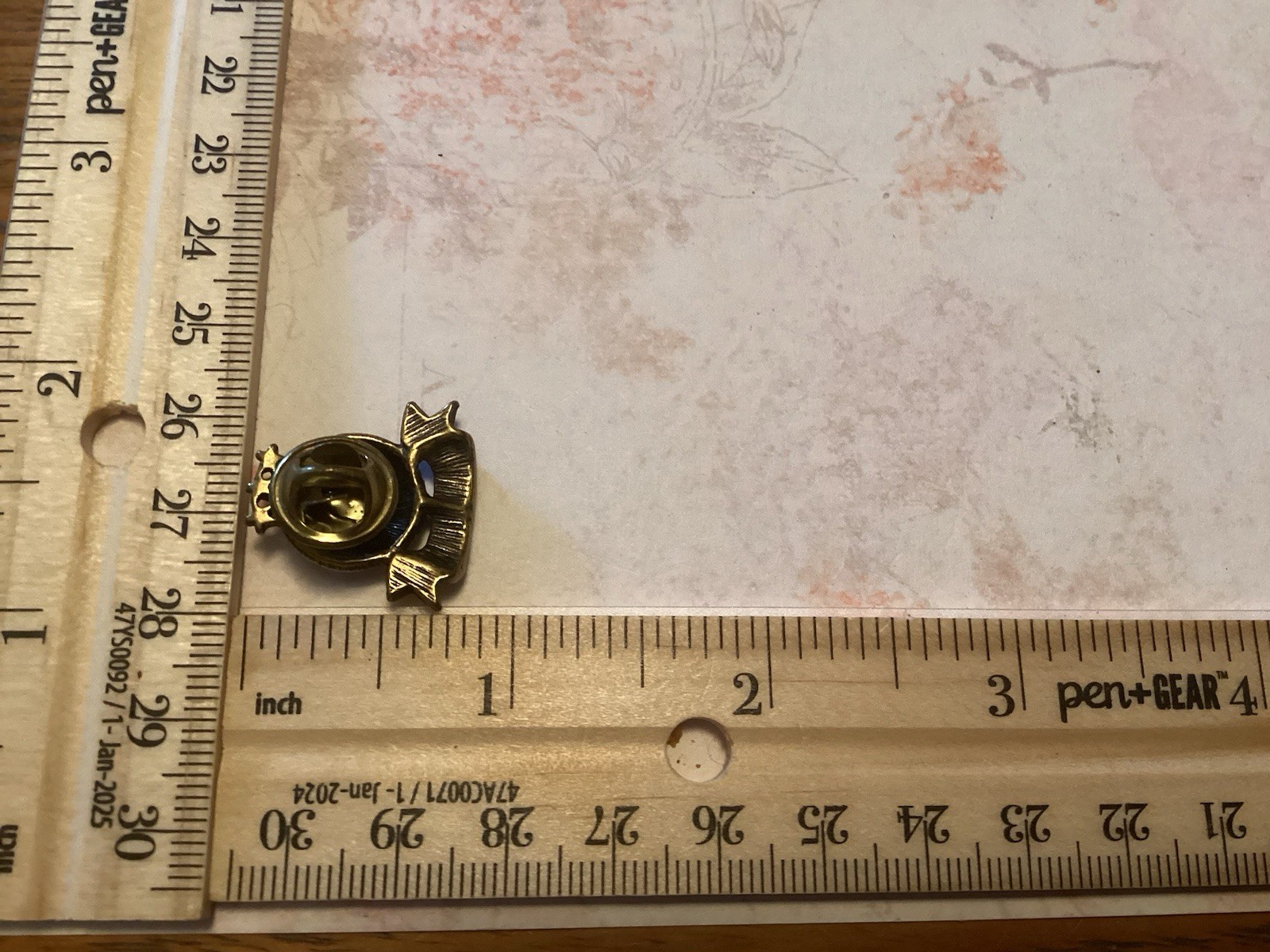 Black And Gold Tone 2000 World Lapel Hat Pin With Stars