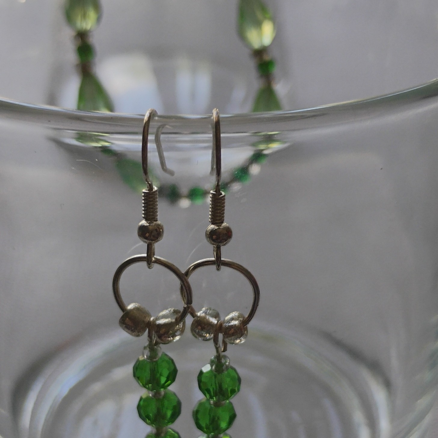 All Elegant Crystals necklace earrings Green briolette Glass Silver metal