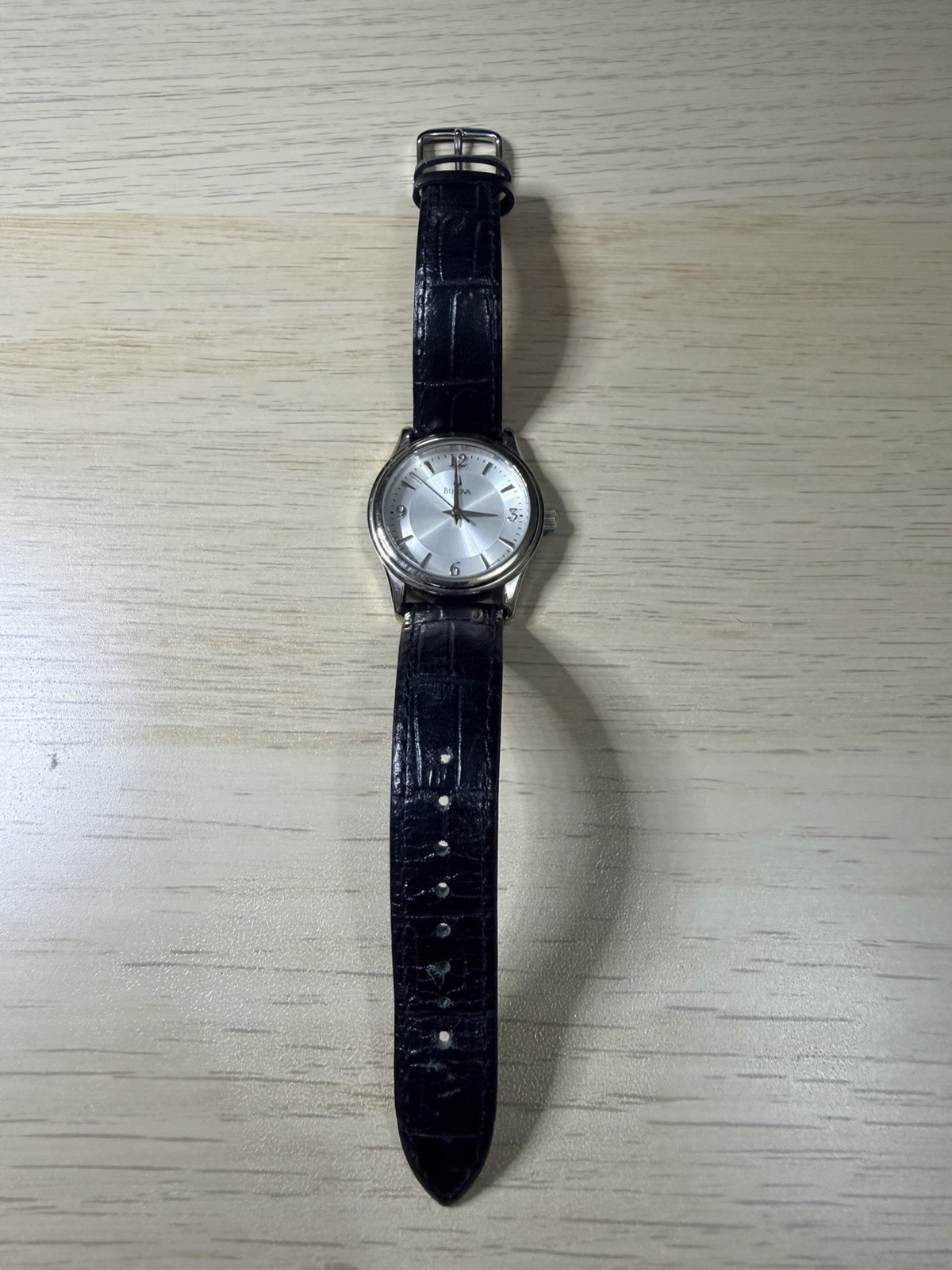 Bulova 96T58 Lady’s Watch 2007 Silver Dial Black Leather Band. Needs Battery