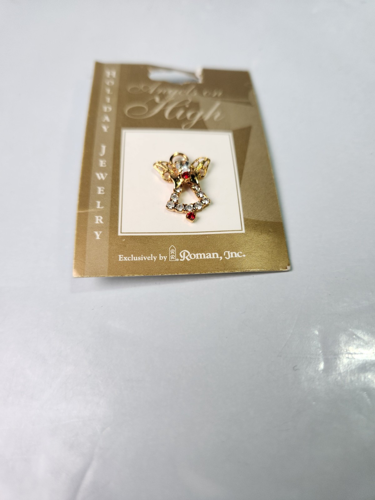 Christmas Pin Angels On High by Roman, Inc Gold Tone Red And Clear Crystals 2001