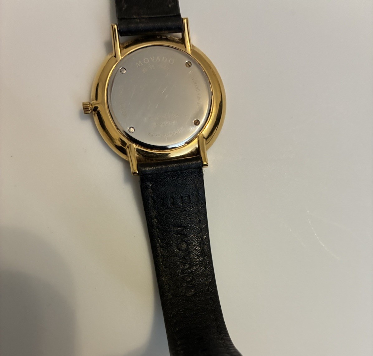 Movado Ultra Slim Women’s Black Dial Leather Strap Quartz Watch – 0607091