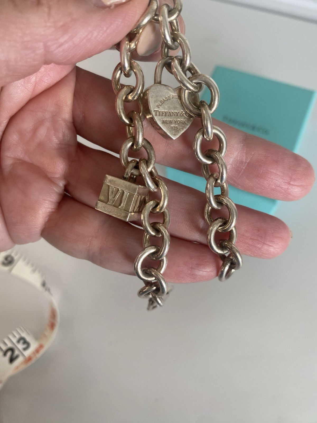 Tiffany & Co. Sterling Silver Charm Bracelet with 2 Charms Length 71/2 Inches