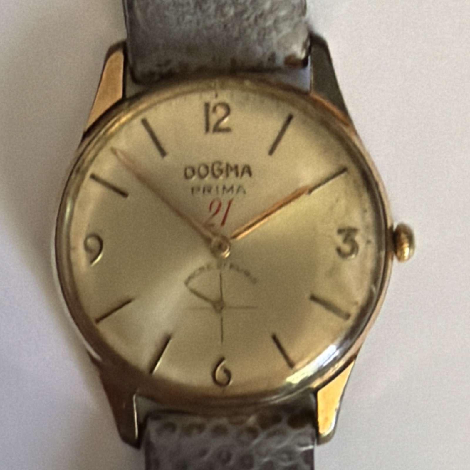 Dogma Prima Swiss Made 21 Jewel Manual Wind Gold Tone Watch Gray Leather Strap