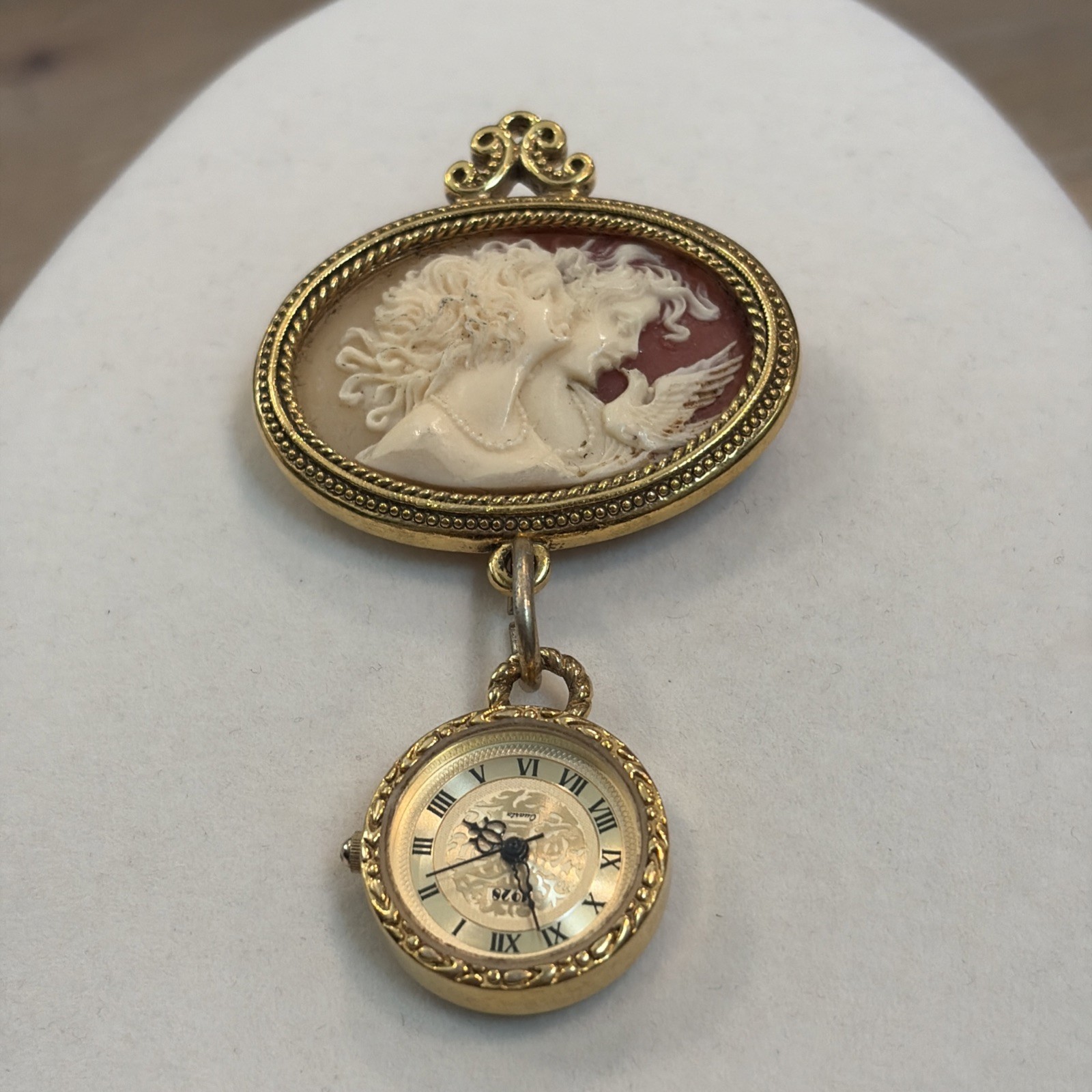 Vintage Cameo Brooch w/watch In Gold Tone By Brand Called “1928”
