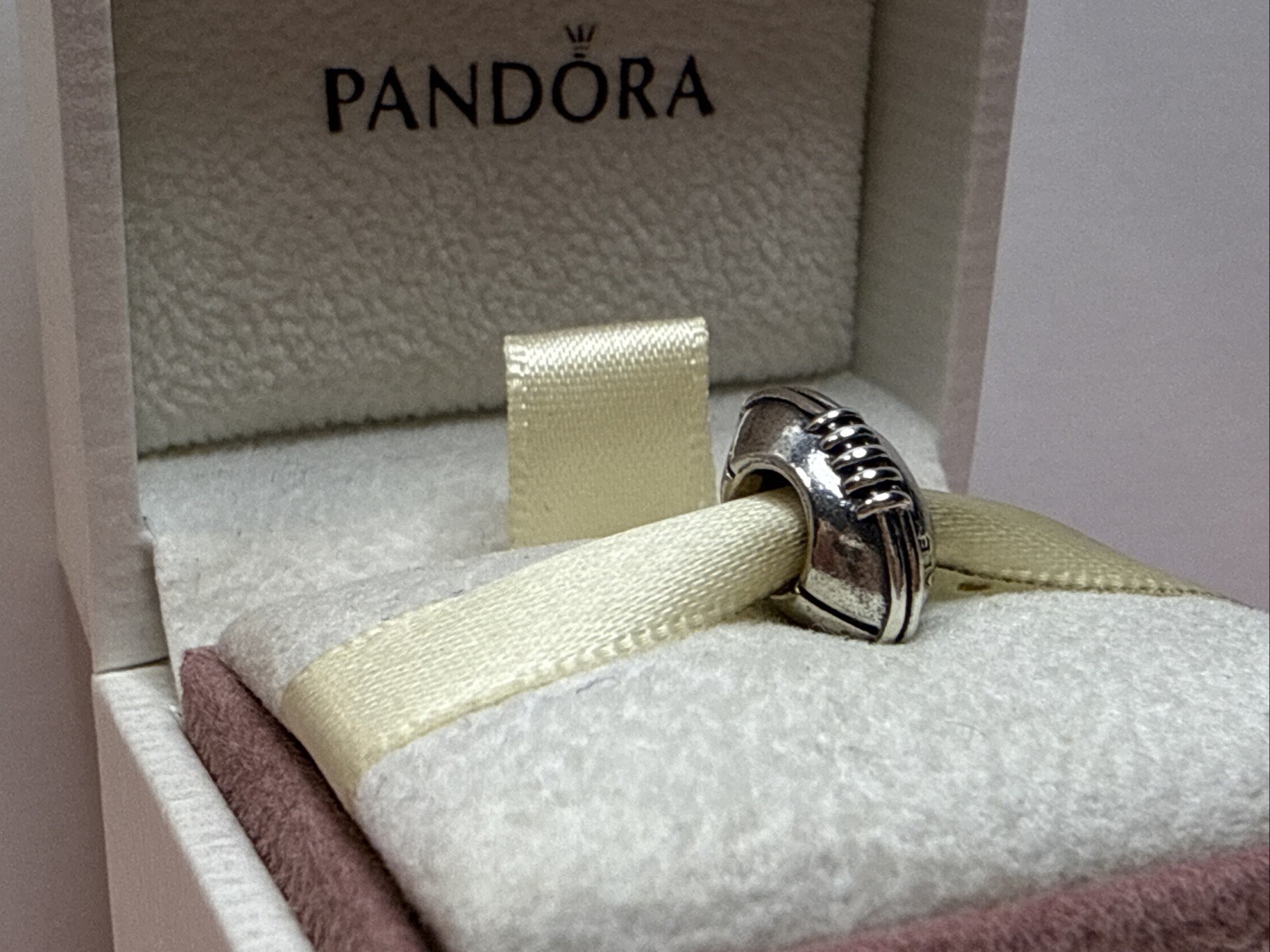 164B NWOT AUTH PANDORA SS FOOTBALL CHARM #790384 RETIRED!