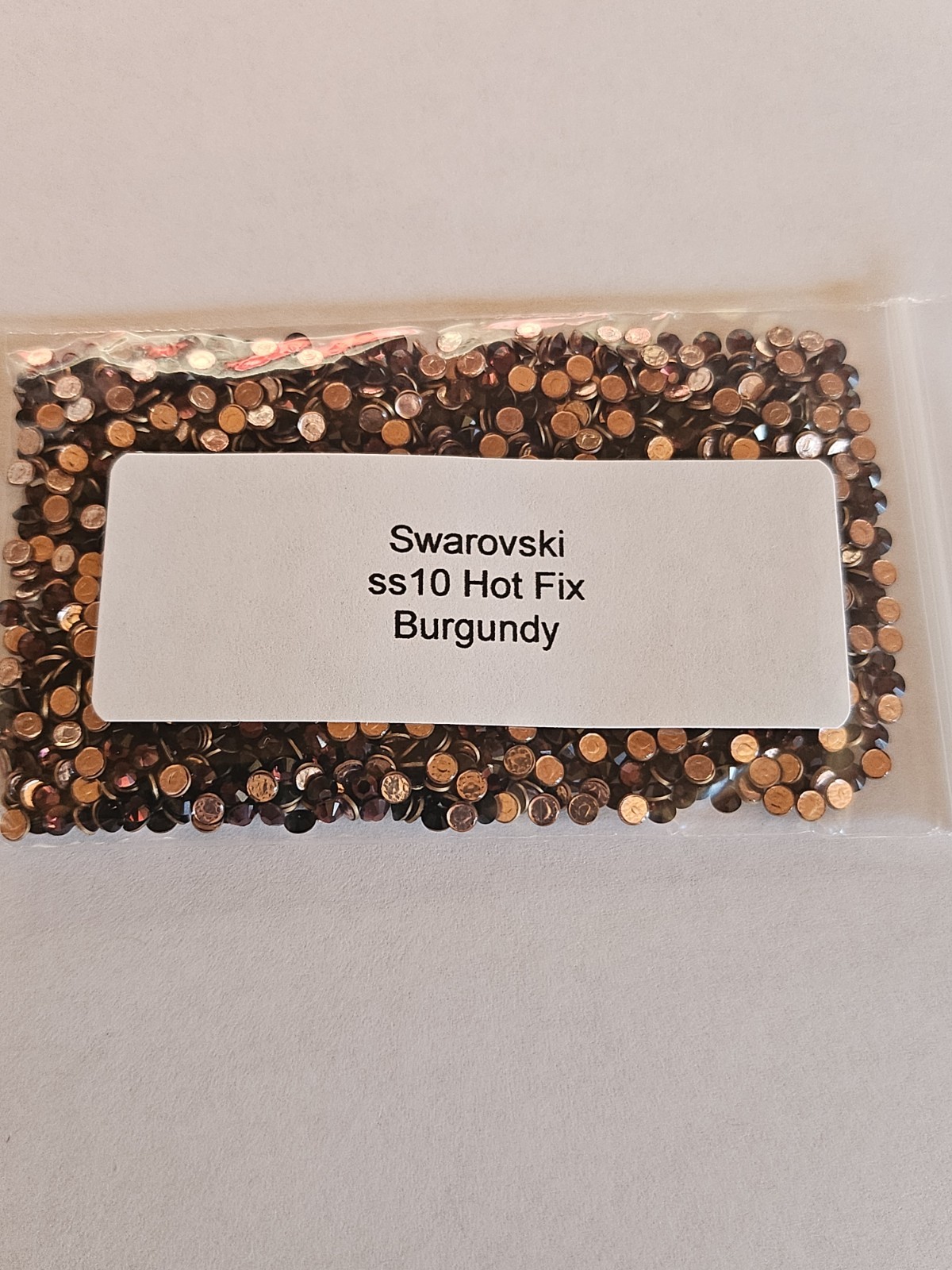 Genuine Swarovski ss10 Hot Fix Crystals in the color LIGHT COLORADO TOPAZ