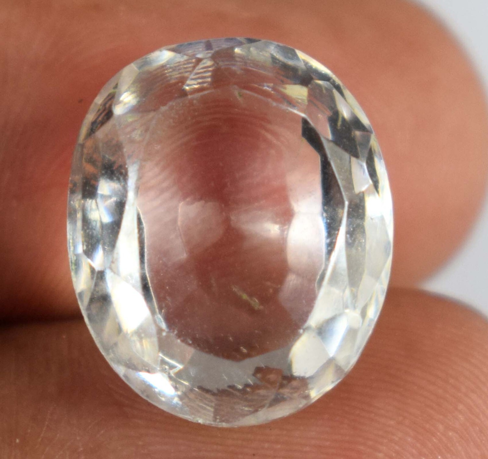 White Montana Sapphire 9.05 Ct/12 mm Natural Oval Gemstone Certified B97819