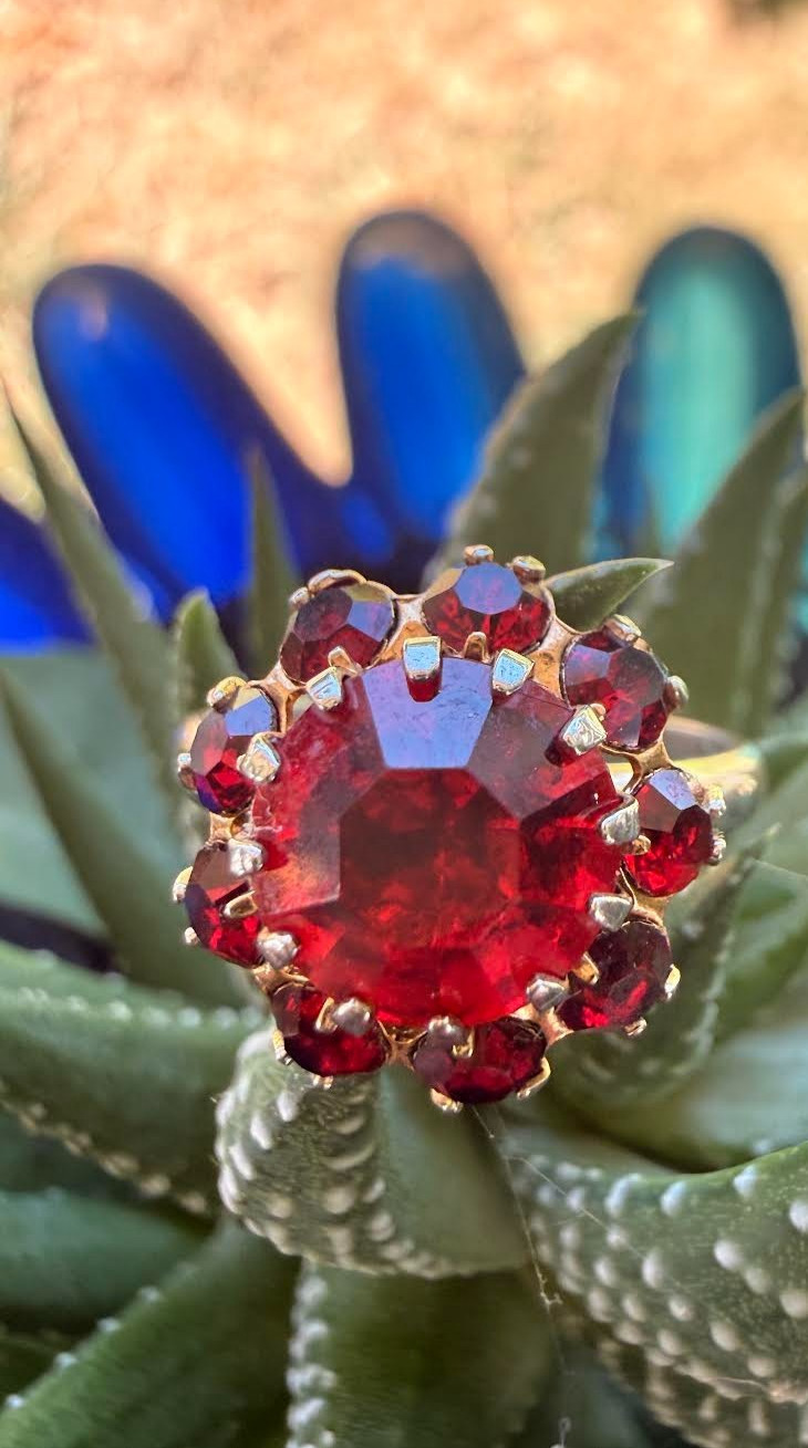 Deep Burgundy ring features a cluster of red rhinestones in a gold-tone setting.