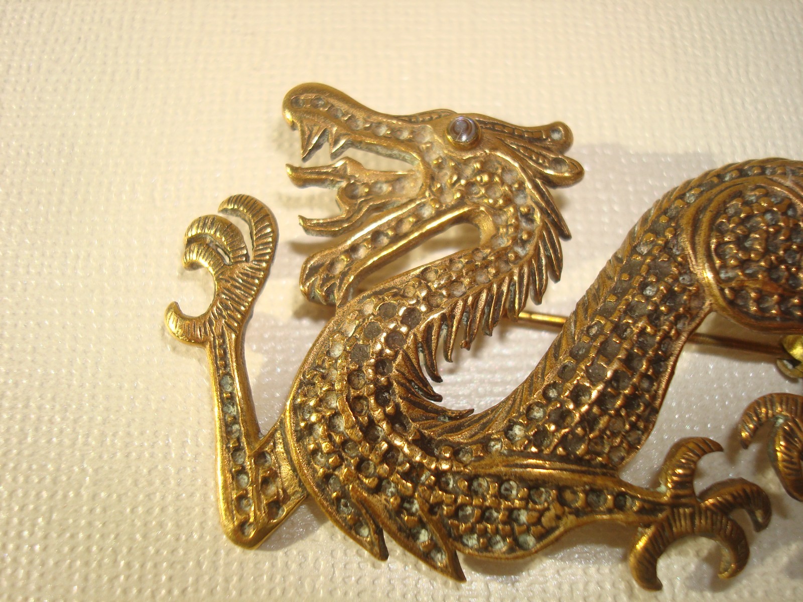 VINTAGE LOT(3) BROOCHES,CHINESE DRAGON,J.J RUSSIAN CATHEDRAL,M/EAST DAGGER PERF.