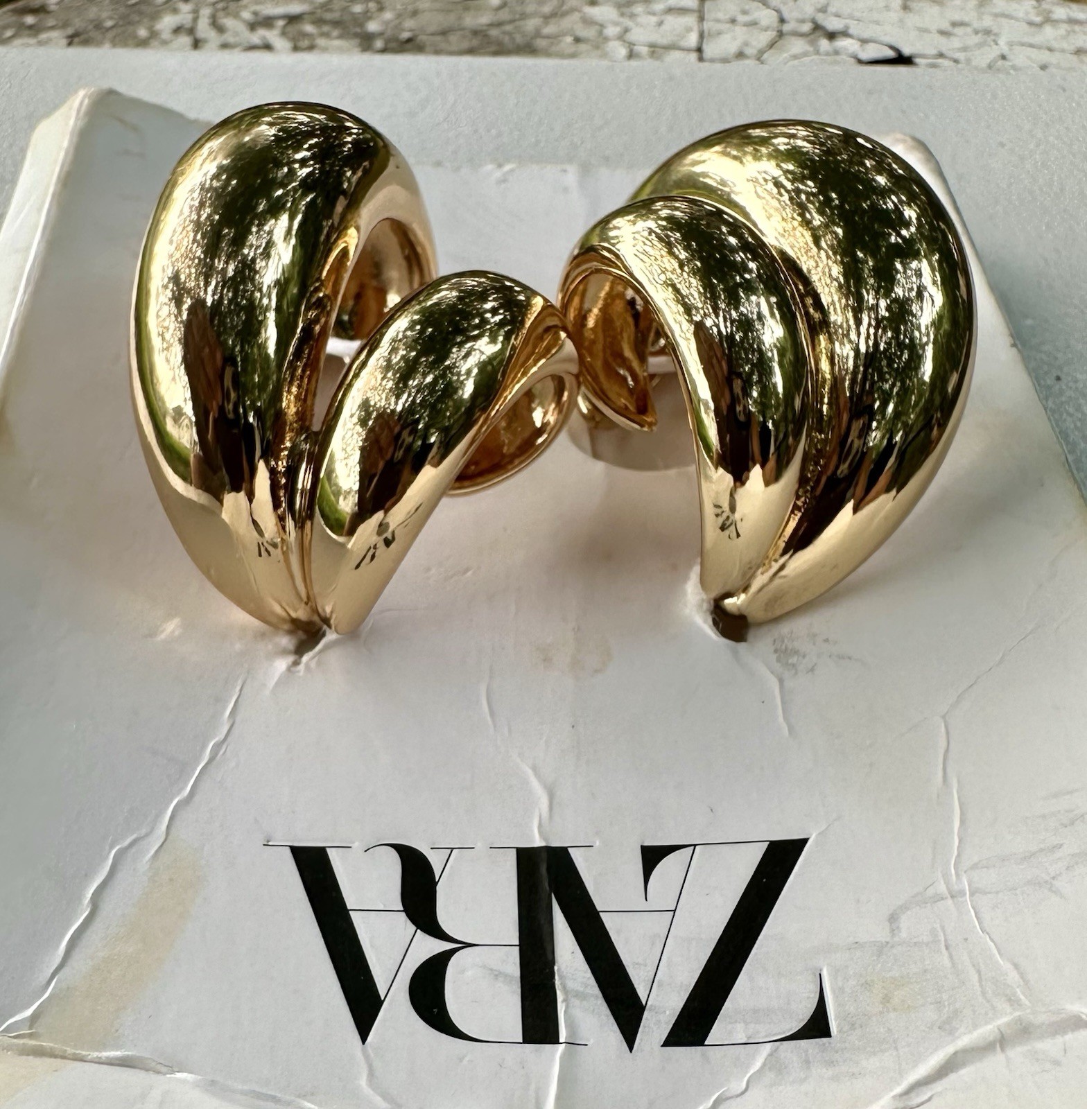 Zara Double Teardrop Earrings in gold.