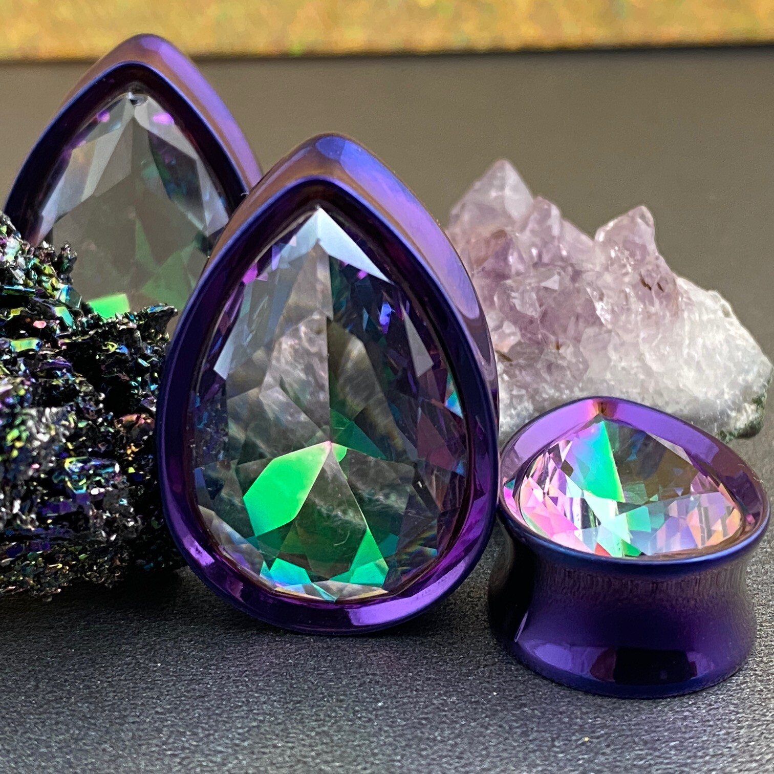 Pair of Purple Steel Teardrop Plugs with Aurora Borealis Gem (PS-286) gauges