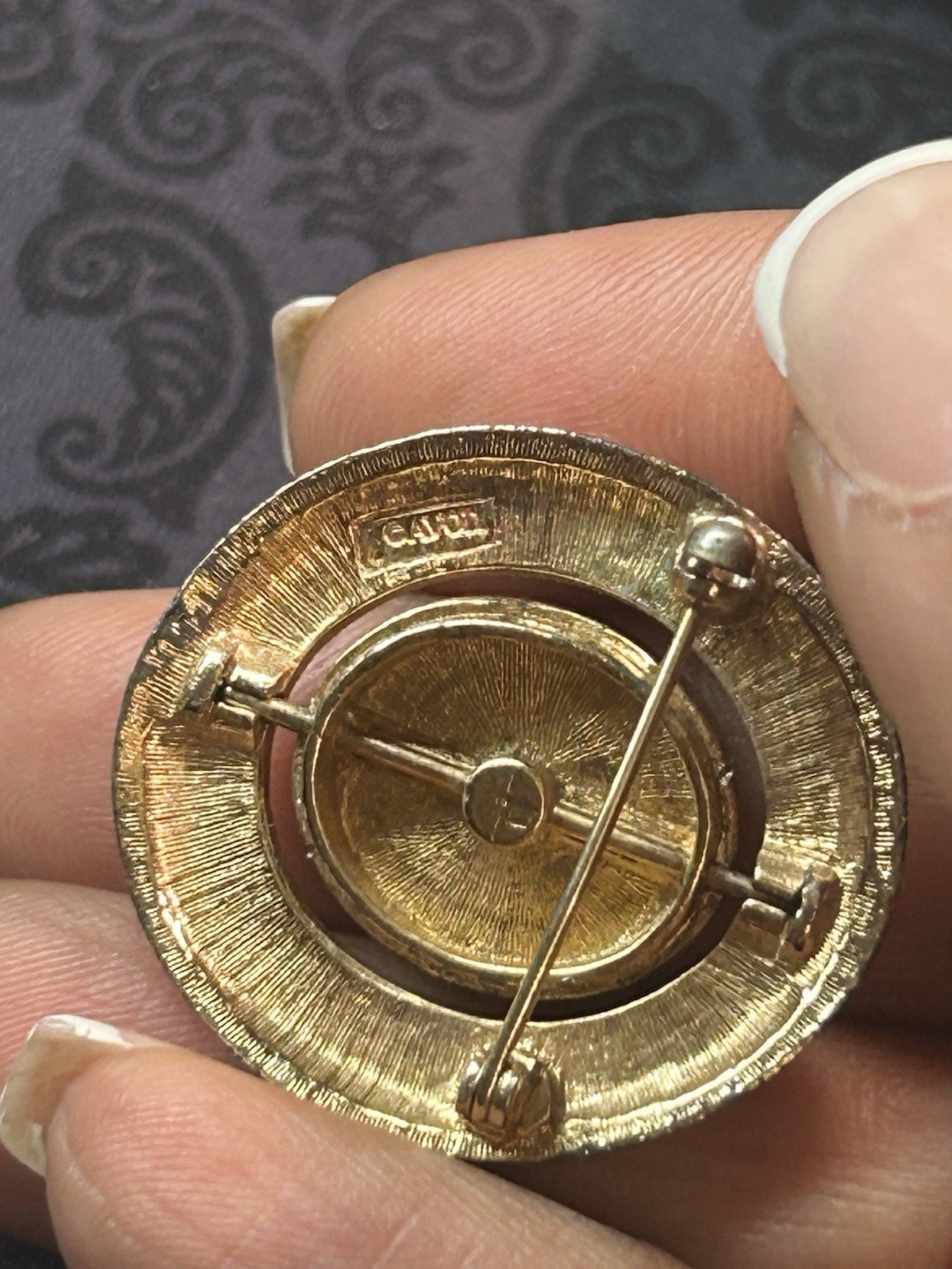 Vintage 1970s Avon Spinner Brooch Gold Tone Rotating Starburst Rhinestone Signed