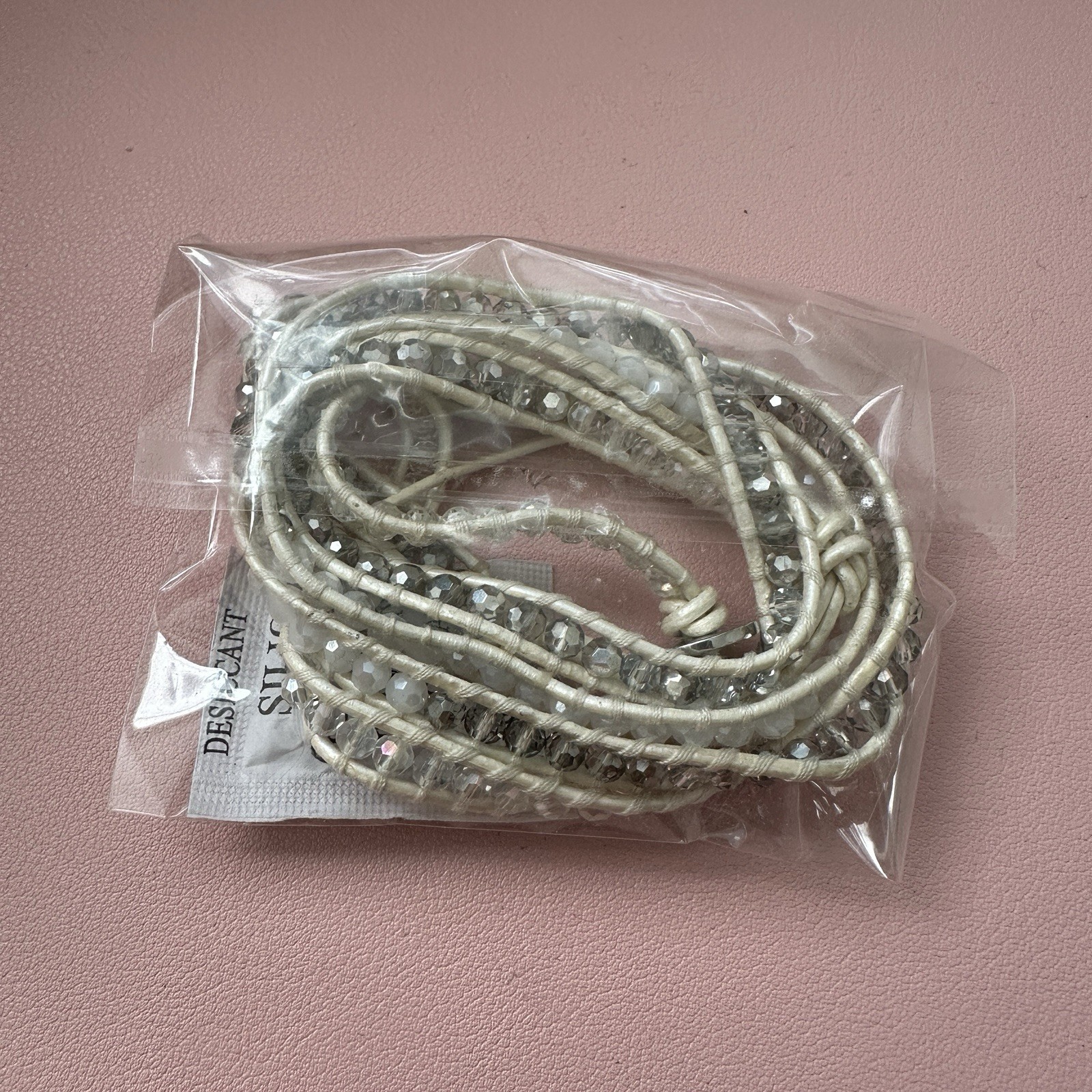 Brandnew/ Unused Very pretty and long to wrap around your wrist