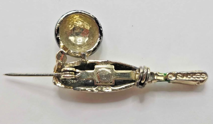 Vintage signed Gerry’s bowling ball brooch. Gold with green rhinestone.