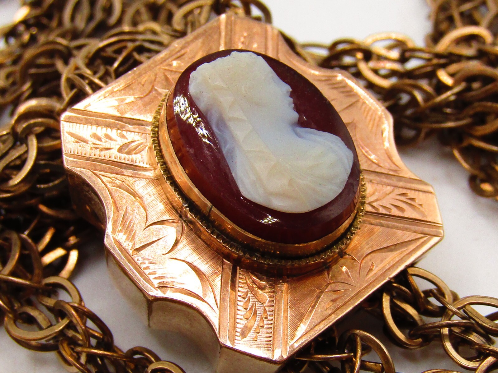 ANTIQUE VICTORIAN LADIES WATCH CHAIN WITH 1OK GOLD CAMEO SLIDE & G.F. CHAIN*