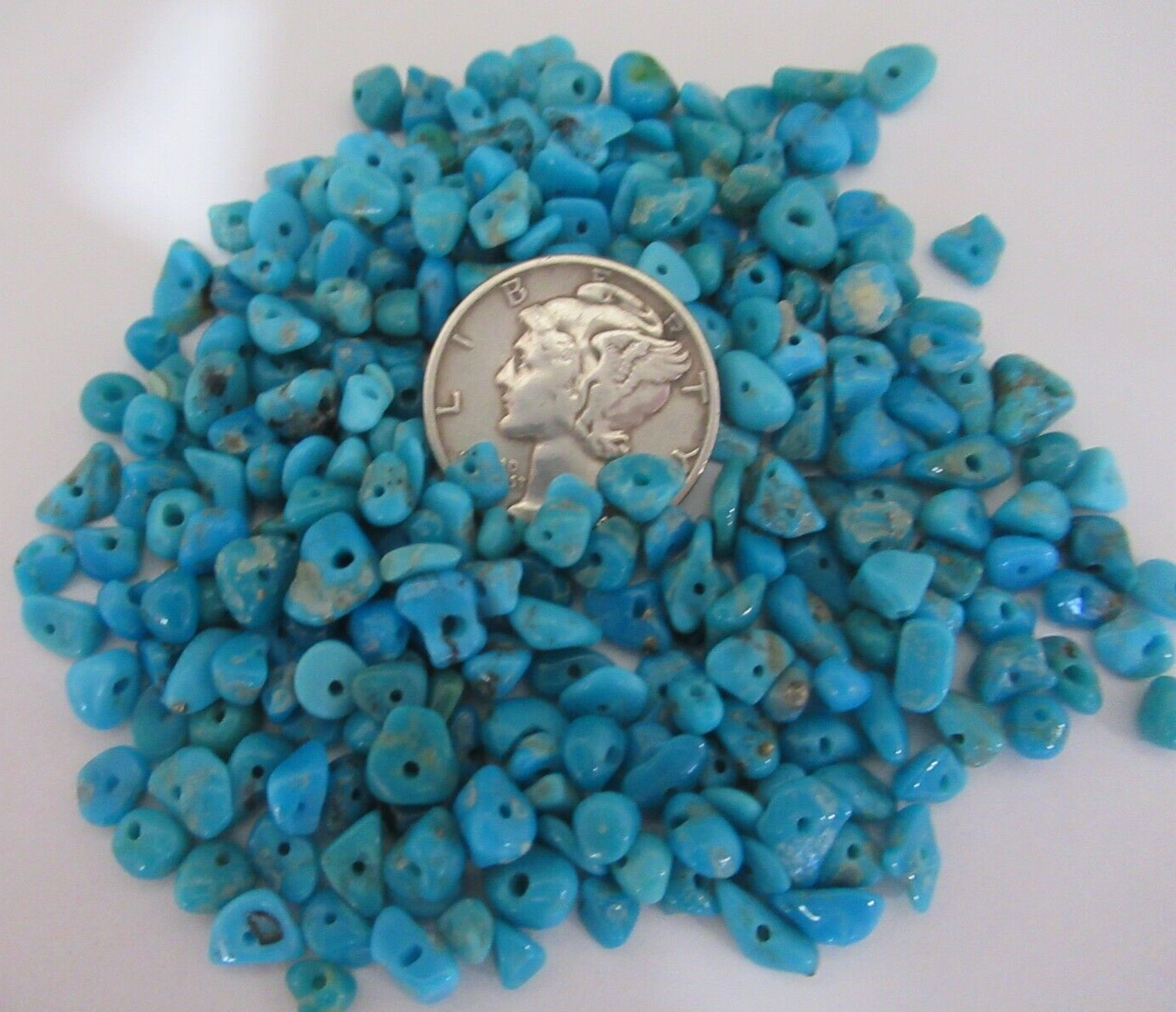 SLEEPING BEAUTY TURQUOISE 1/2 OZ SMALL DRILLED NUGGETS 4X3mm TO 7X4mm #642
