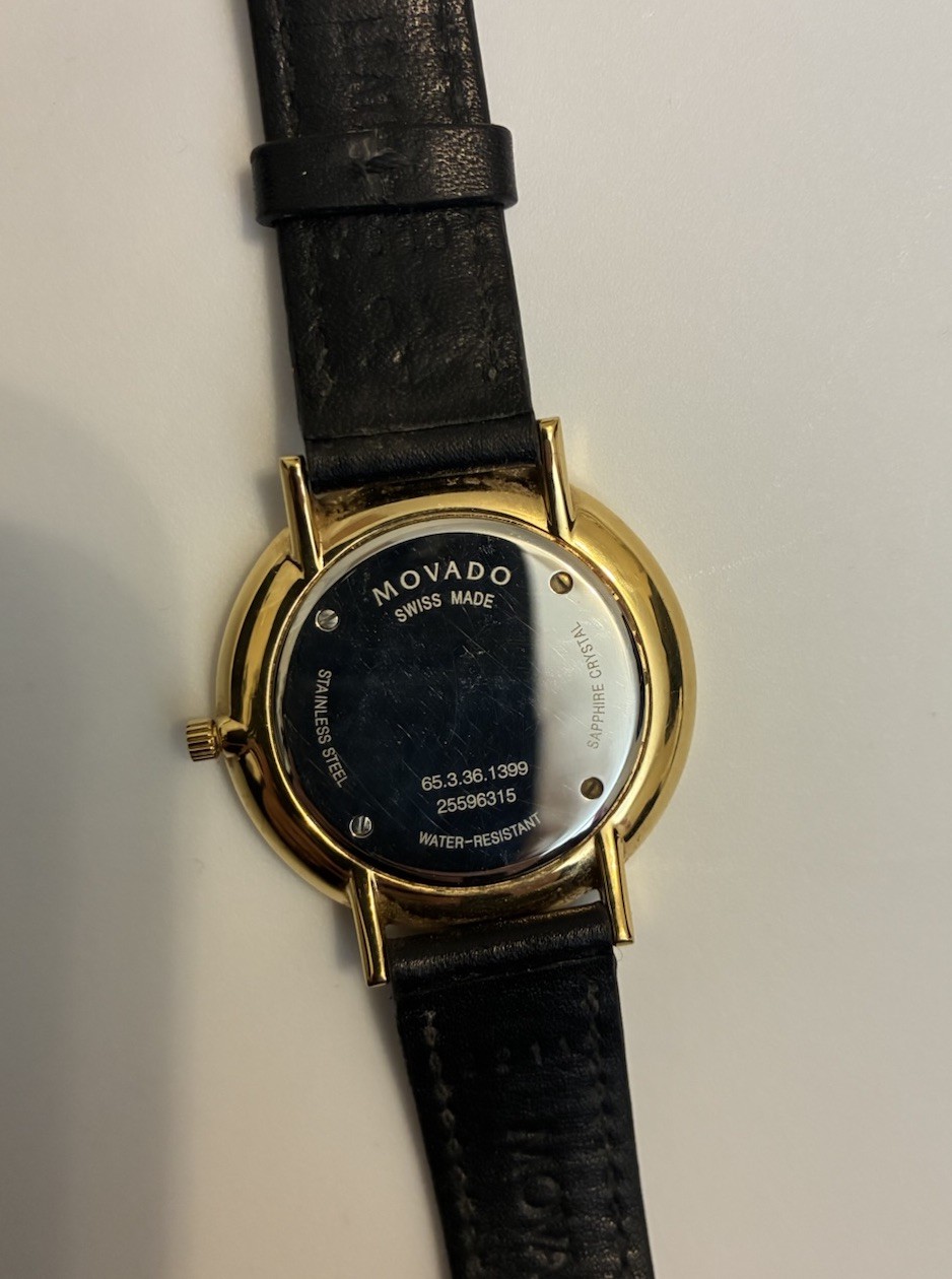 Movado Ultra Slim Women’s Black Dial Leather Strap Quartz Watch – 0607091