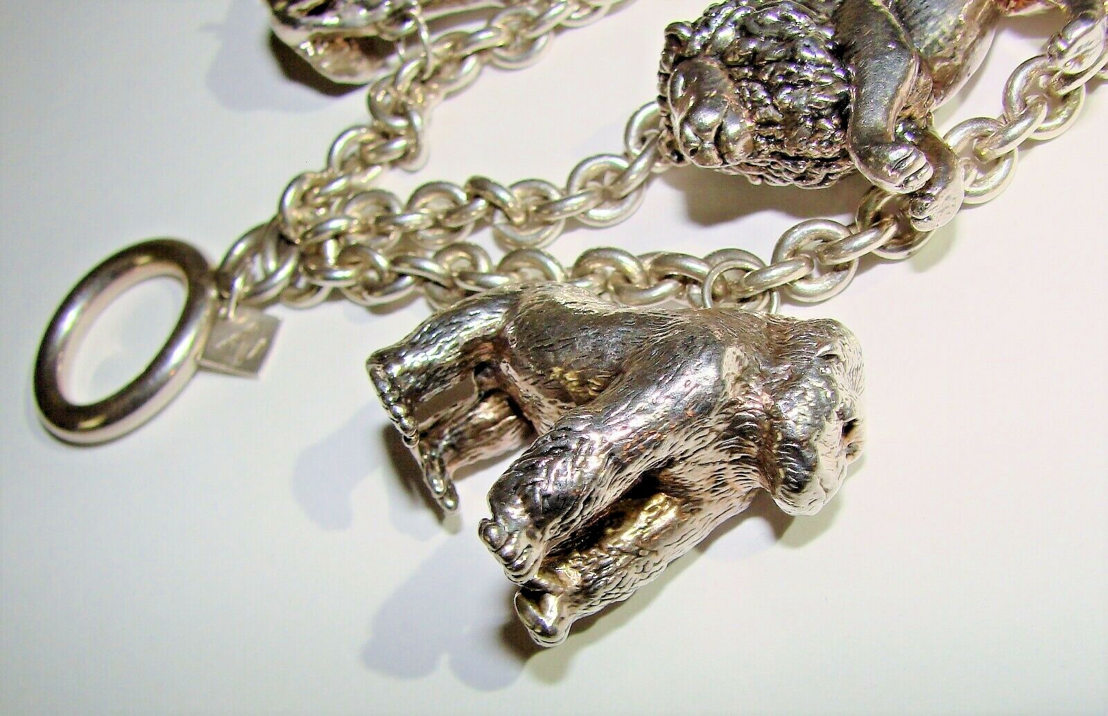 SUSAN CUMMINGS STERLING SILVER VINTAGE ENDANGERED SPECIES ANIMALS BRACELET LARGE