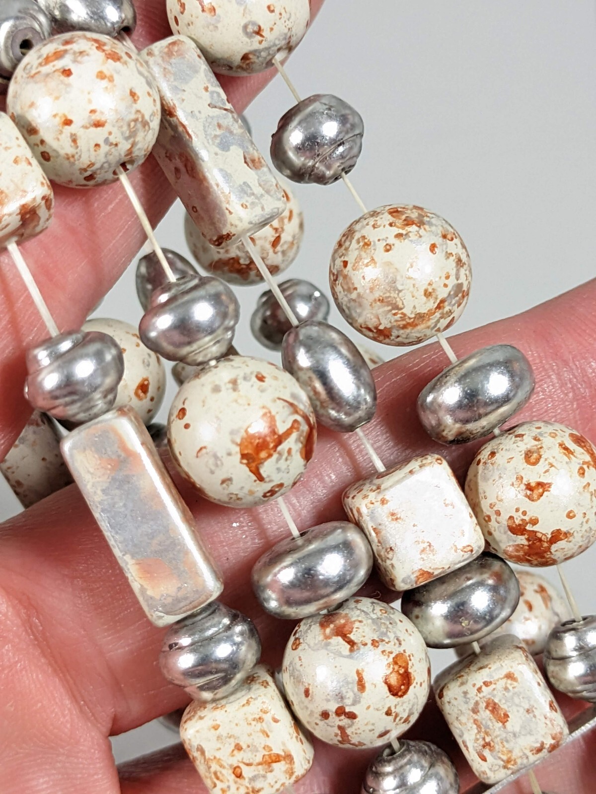 Silver Tone Ivory Color Brown Splatter Four Row Wide Stretch Bracelet 6 inches