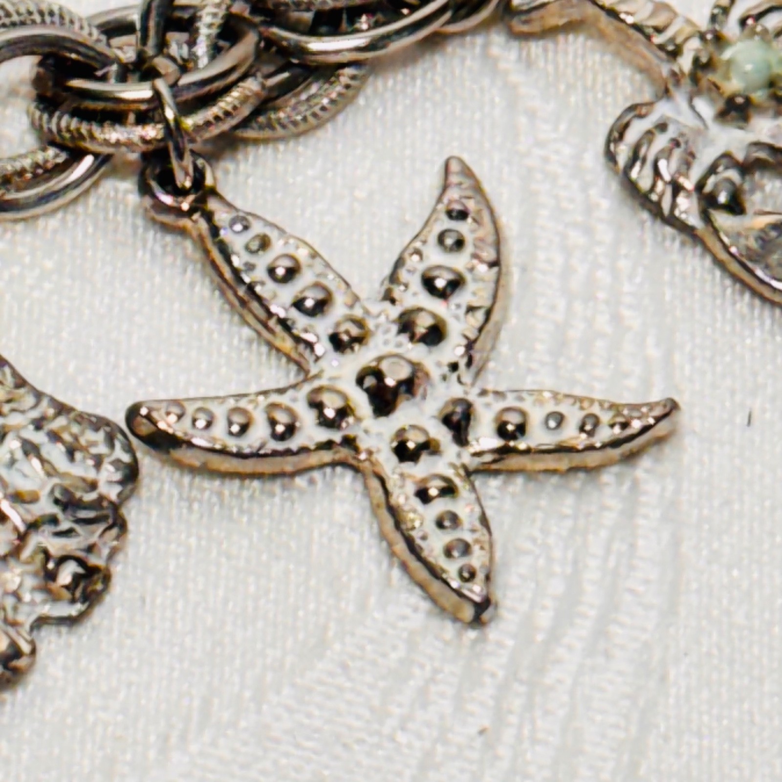 BRACELET ocean life charms starfish shells fish lobster fold over clasp vintage