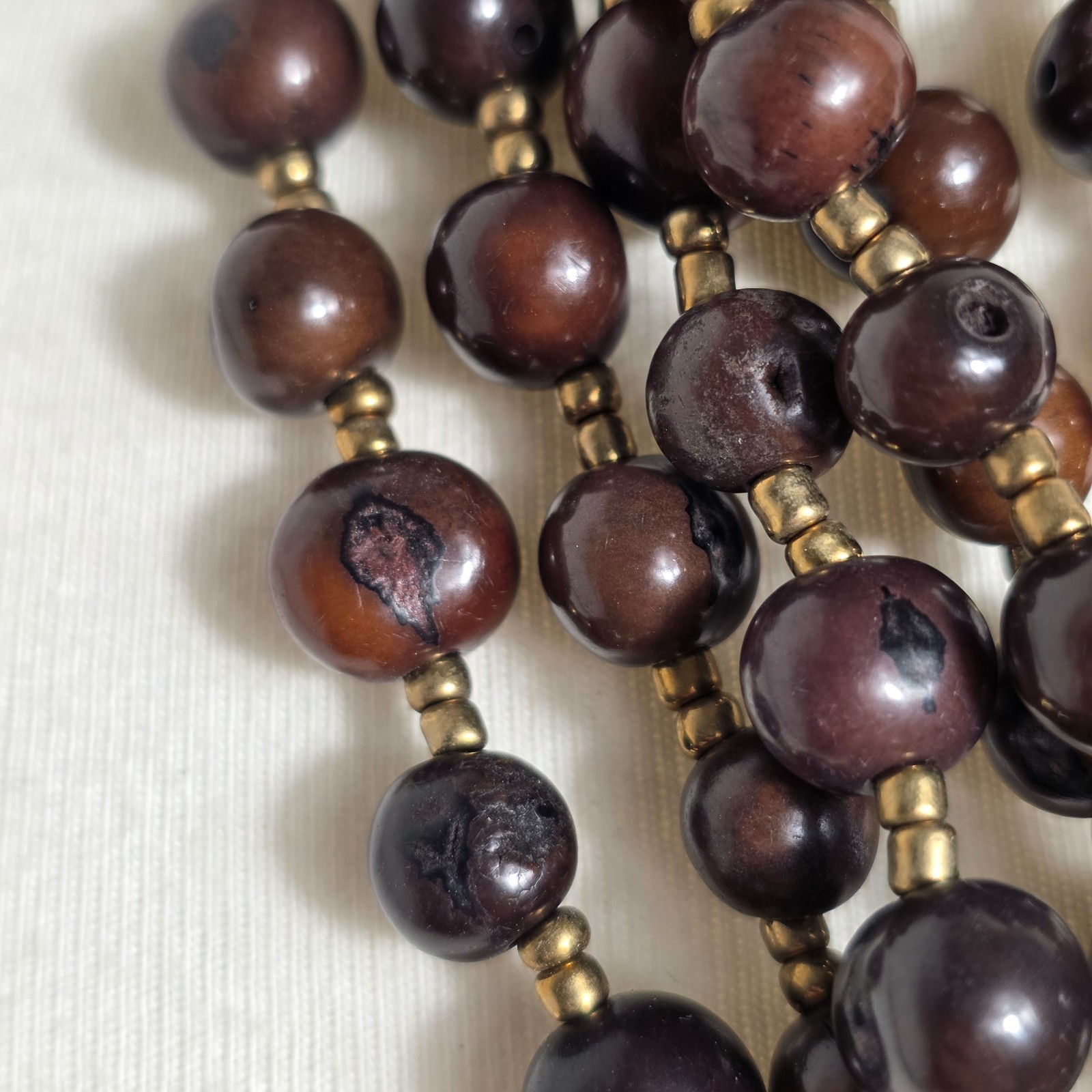 Multi-Strand Brown Acai Seed Bead Necklace with Gold Seed Bead Spacers