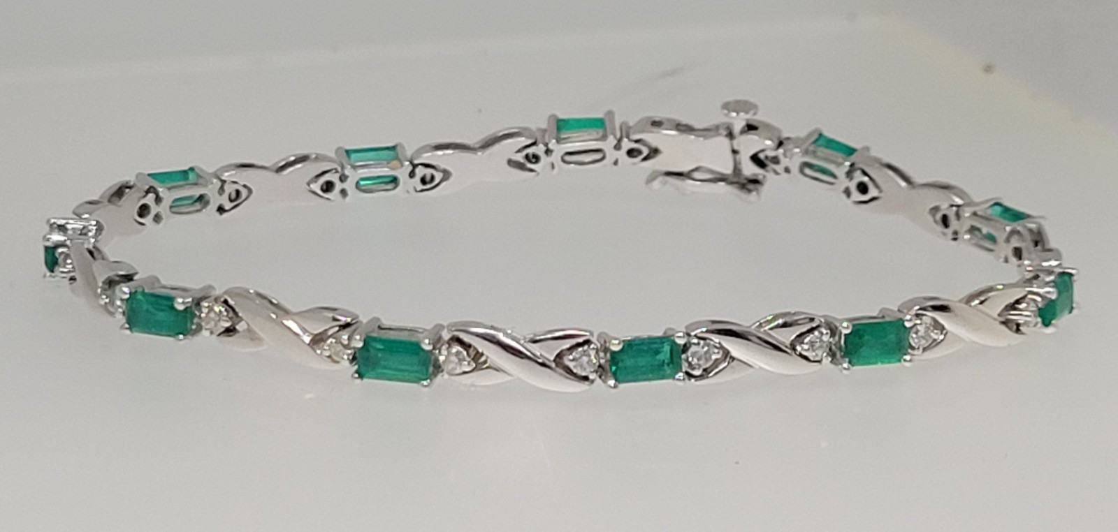 18k White Gold 3.3 cttw Gorgeous Emeralds and .63 cttw Diamond Bracelet