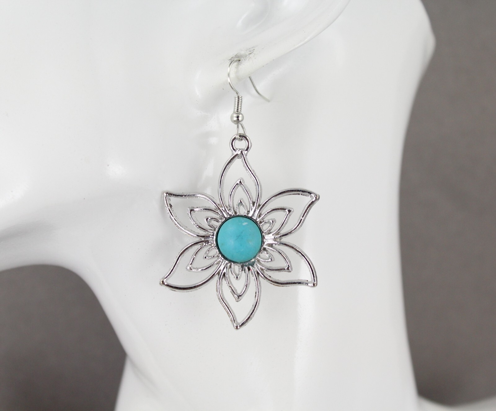 turquoise silver earrings lightweight flower outline dangle 2 3/8 long stamped