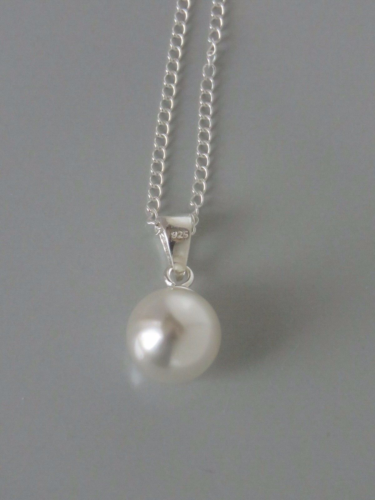 925 Sterling Silver Necklace Made With a Swarovski White Pearl Pendant (sa10.)